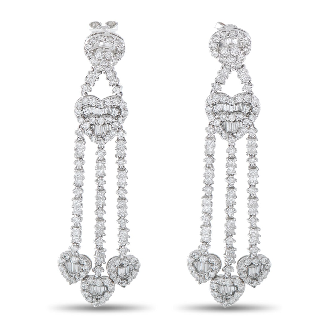 18K White Gold 3.60ct Diamond Heart Drop Earrings: 18K White Gold 3.60ct Diamond Heart Drop Earrings Crafted in 18K white gold, these drop earrings are built around a vertical composition of heart-shaped diamond clusters. Each heart combines round and