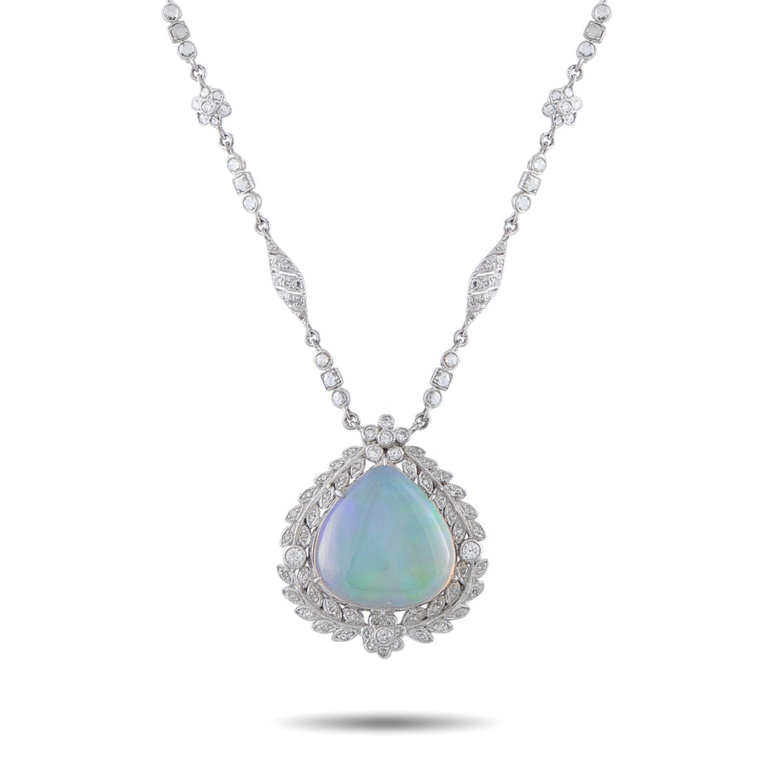 Platinum 3.12ct Diamond and Opal Pendant Necklace: Platinum 3.12ct Diamond and Opal Pendant Necklace. . Add a touch of old fashioned elegance to any ensemble with this exquisite luxury necklace. . The 13.82 carat Opal center stone emanates an array of