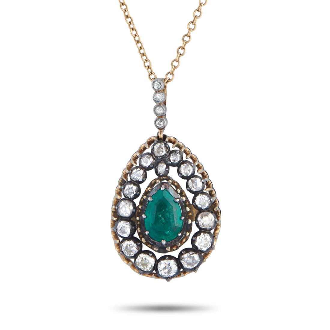 14K Yellow Gold Silver 1.0ct Diamond and Emerald Necklace: 14K Yellow Gold Silver 1.0ct Diamond and Emerald Necklace Old mine-cut diamonds create a pear-shaped frame, tapering gently toward the pear’s pointed end. At the diamond frame’s center is a 1.25 c
