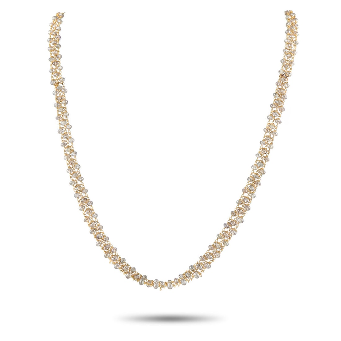 18K Yellow Gold 24.5ct Diamond Briolette Necklace: 18K Yellow Gold 24.5ct Diamond Briolette Necklace These diamond briolletes are are set directly onto the chain, appearing at natural intervals as faceted beads. Their warm champagne tint blends seamle