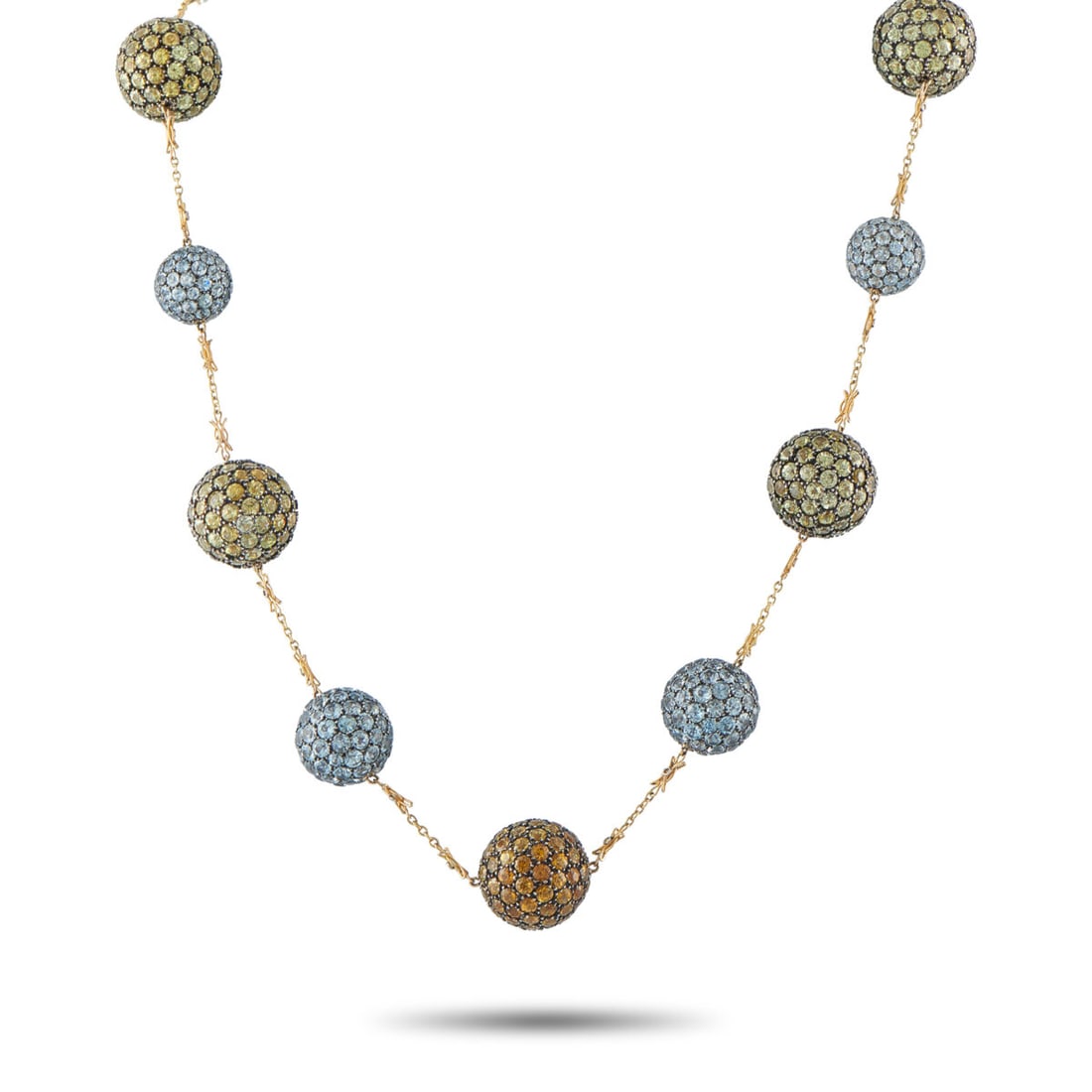 18K Yellow Gold Peridot, Aquamarine, and Citrine Necklace: 18K Yellow Gold Peridot, Aquamarine, and Citrine Necklace A stylish, contemporary design sets this luxury necklace apart from all other pieces in your collection. On this elegant accessory, a series o