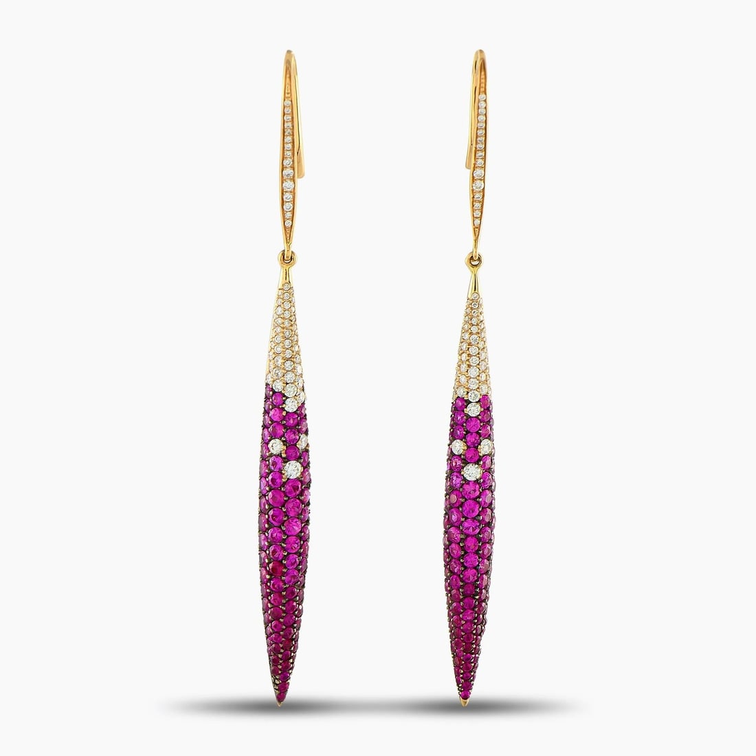 SALAVETTI 18K Rose Gold 0.56ct Diamond and Sapphire Earrings: SALAVETTI 18K Rose Gold 0.56ct Diamond and Sapphire Earrings A stylish, pointed design makes these Salavetti earrings simply unforgettable. Accented by sparkling Diamonds totaling 0.56 carats, radiant