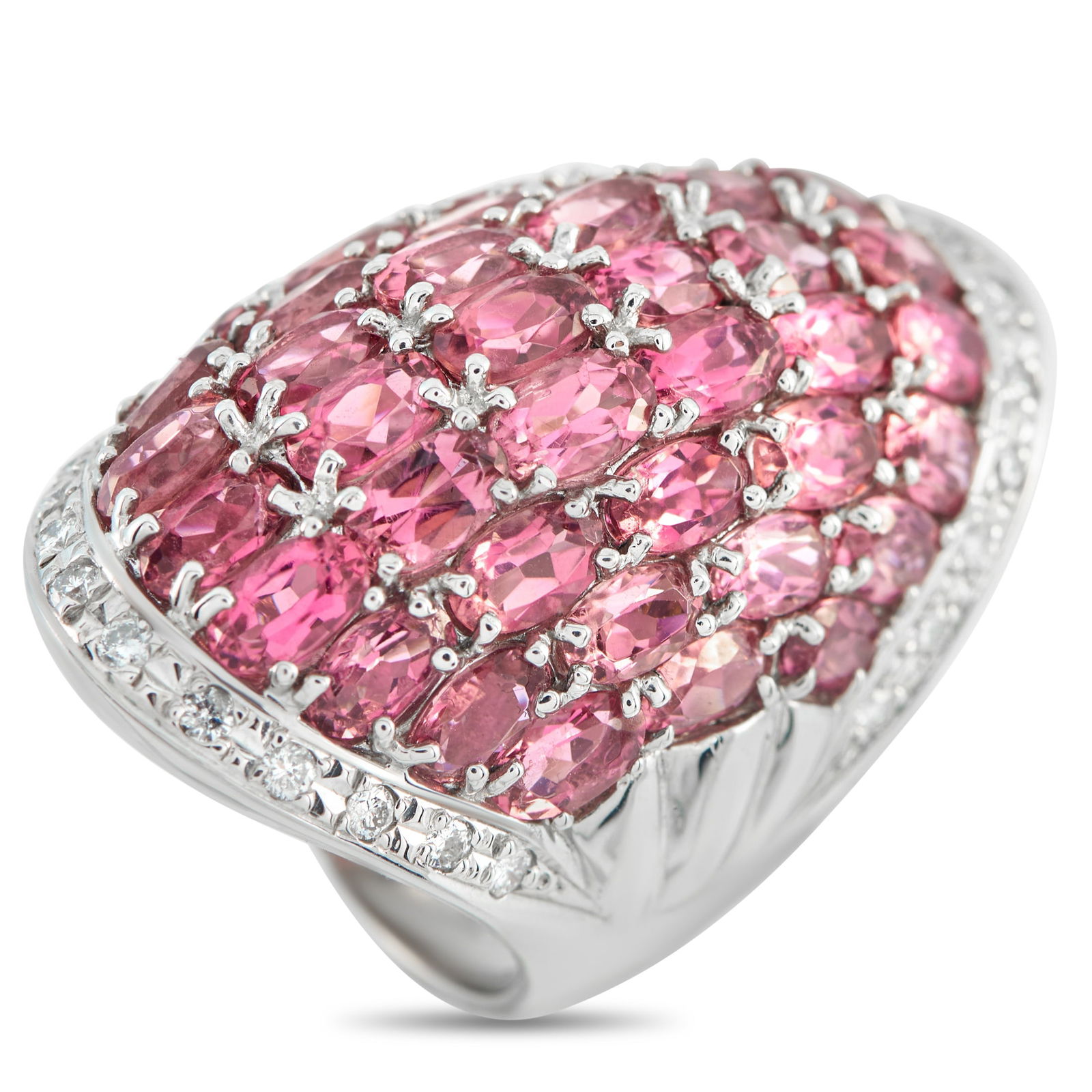 Platinum 0.48ct Diamond and Tourmaline Cocktail Ring: Set with pink tourmalines, this showstopping cocktail ring makes a strong impression the moment it’s worn. It showcases a broad, sculpted form, with a 35-by-20-millimeter top that curves gently, lik