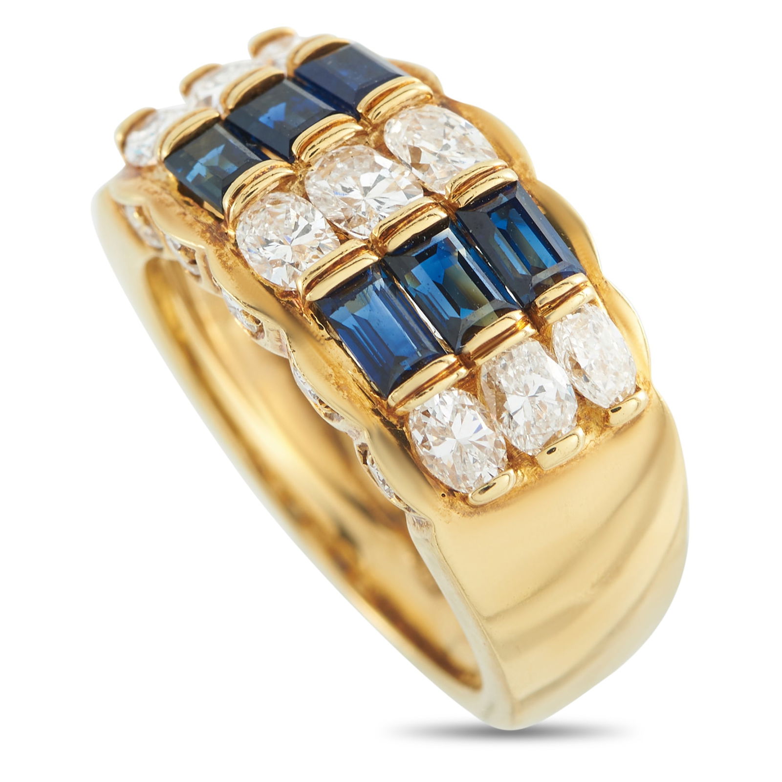 18K Yellow Gold 1.44ct Diamond and Sapphire Ring: This luxury ring is incredibly unique. At the top of the design, Sapphires with a total weight of 1.38 carats alternate with Diamonds totaling 1.44 carats. Set in 18K Yellow Gold, a 5mm wide band and
