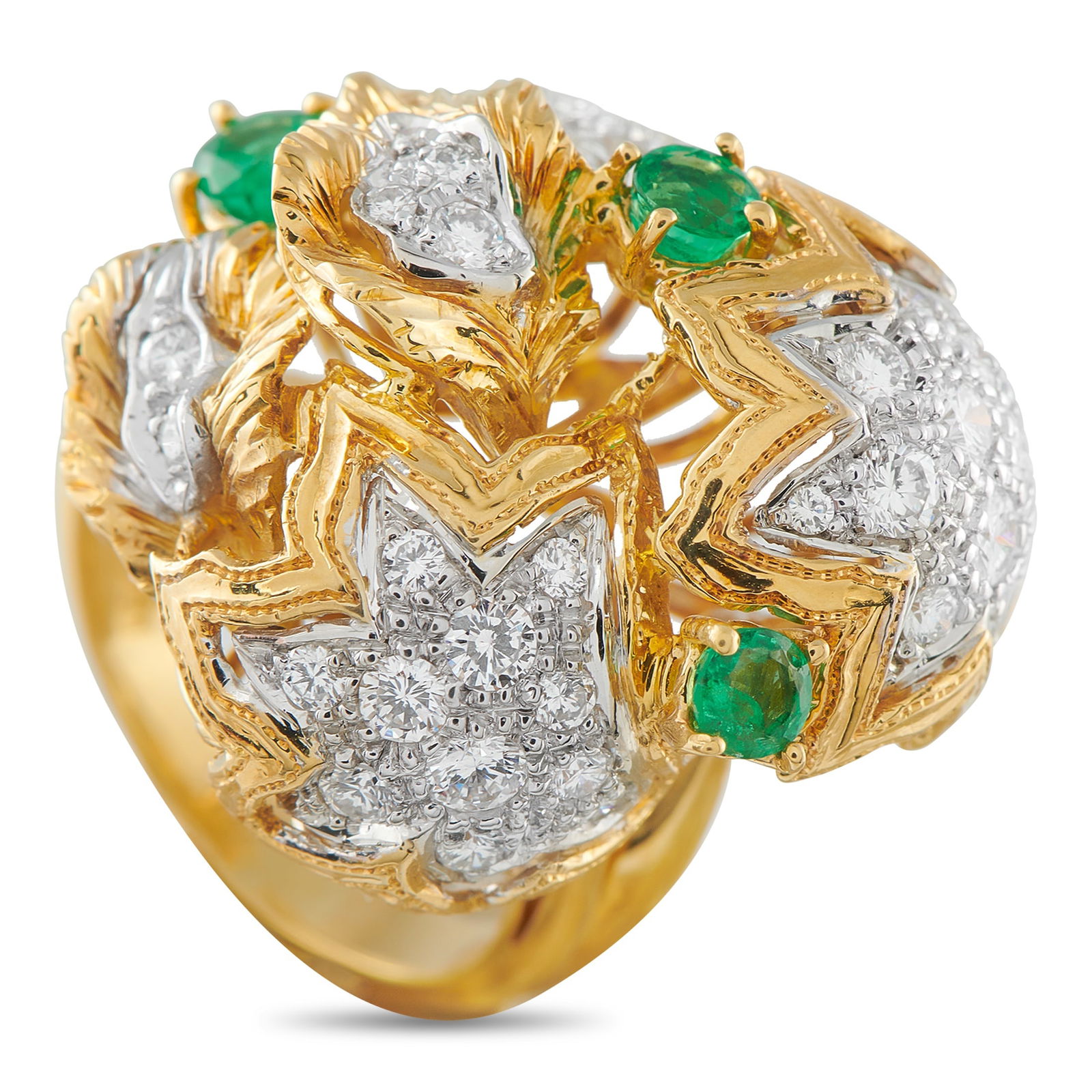 18K Yellow Gold 1.65ct Diamond and Emerald Ring: Designed around a sense of bloom and fullness, this ring presents a rich and dimensional look. A split shank rises to support a wide, rounded centerpiece that spreads across the finger. The top is com