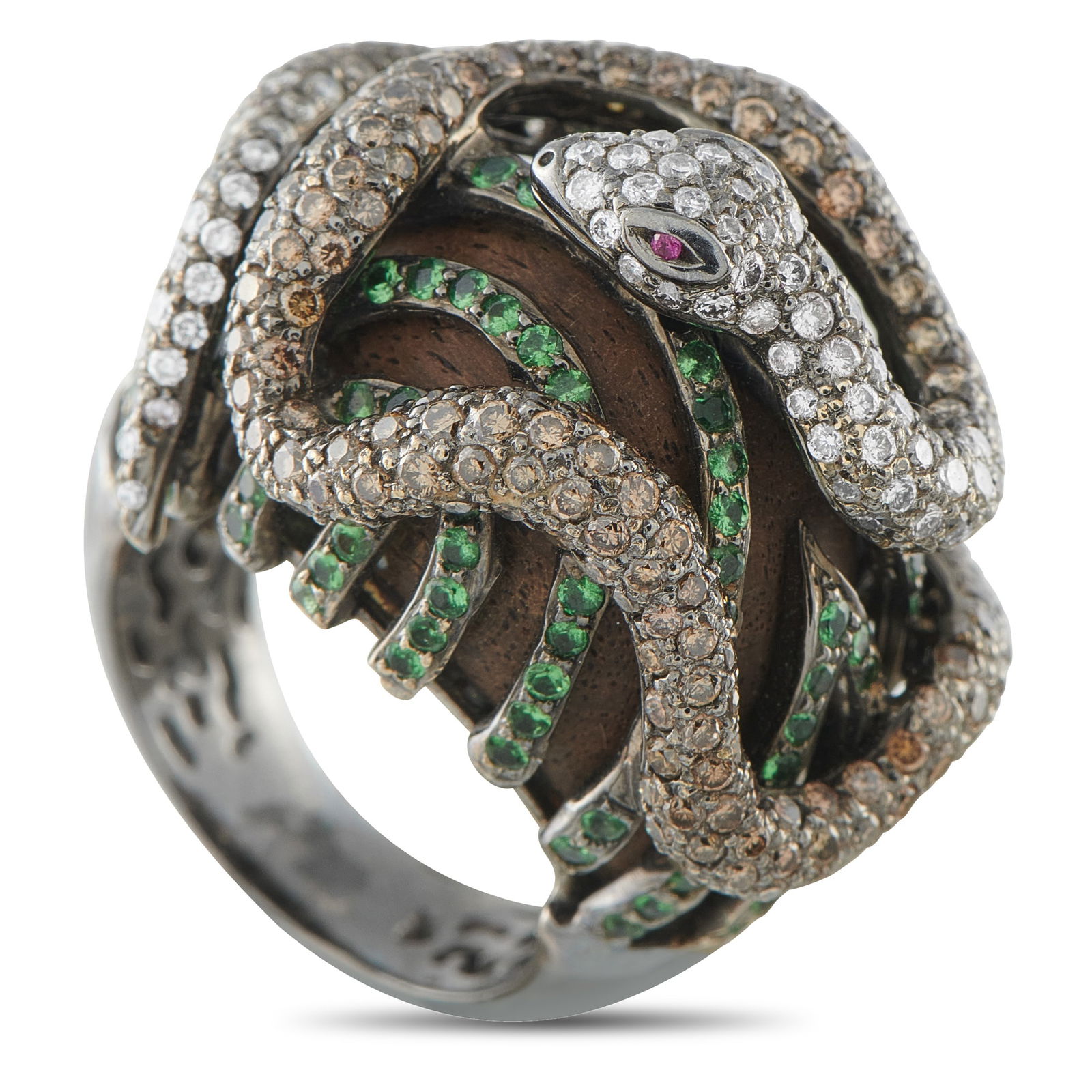 18K White Gold 2.25ct Diamond and Sapphire Snake Ring: This domed ring tells a story through form and detail. Rows of green sapphires create a leafy base across a wide surface, setting the scene. From this ground rests a sculpted snake, its body pavé-set