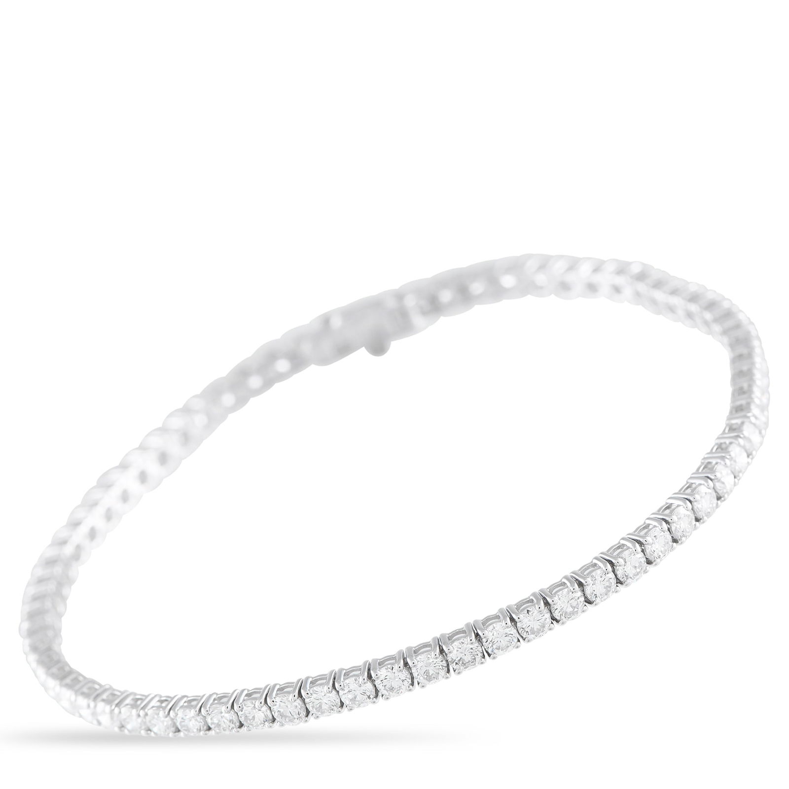 14K White Gold 4.58ct Diamond Tennis Bracelet: Add a touch of sparkle to any ensemble with this traditional tennis bracelet. The simple 14K White Gold setting comes to life thanks to a series of sparkling Diamonds totaling 4.58 carats. It measures
