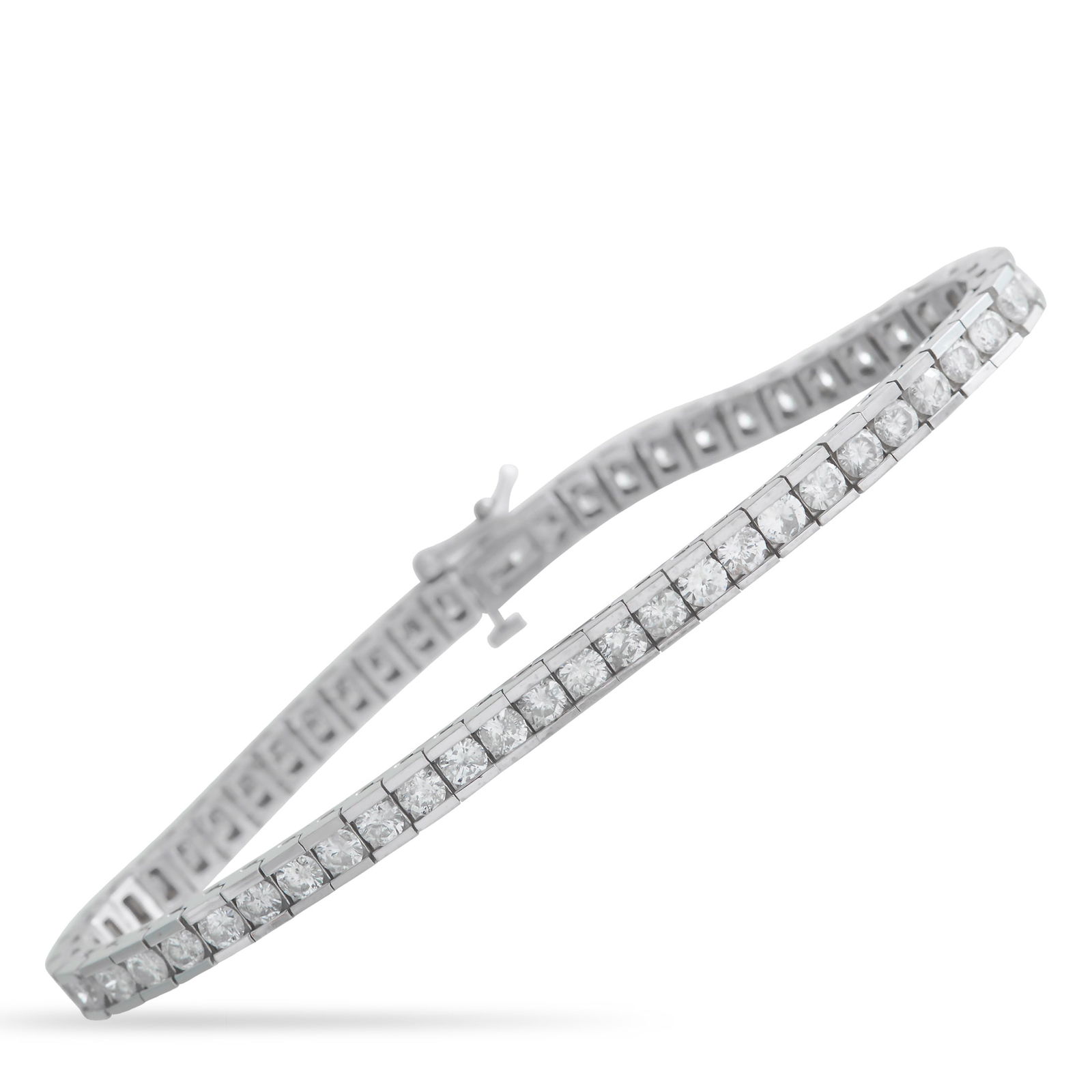 14K White Gold 5.60ct Diamond Tennis Bracelet: Channel set Diamonds with a total weight of 5.60 carats make this tennis bracelet incredibly elegant. Sleek and stylish, the understated 14K White Gold setting allows it to effortlessly complement any