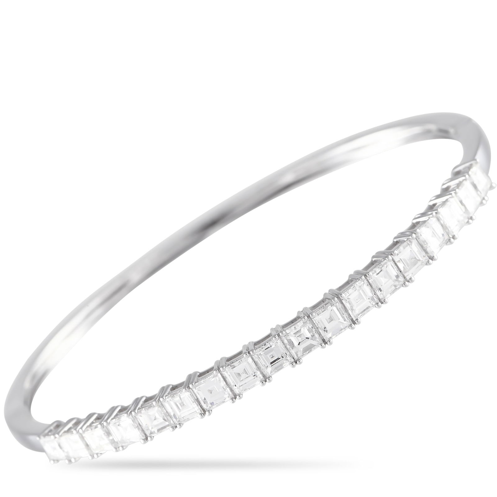 18K White Gold 4.0ct Diamond Bracelet: Square-cut diamonds with a total weight of 4.0 carats serve as a stunning focal point on this impressive bangle bracelet. Ideal for any occasion, the minimalist setting is crafted from 18K white gold