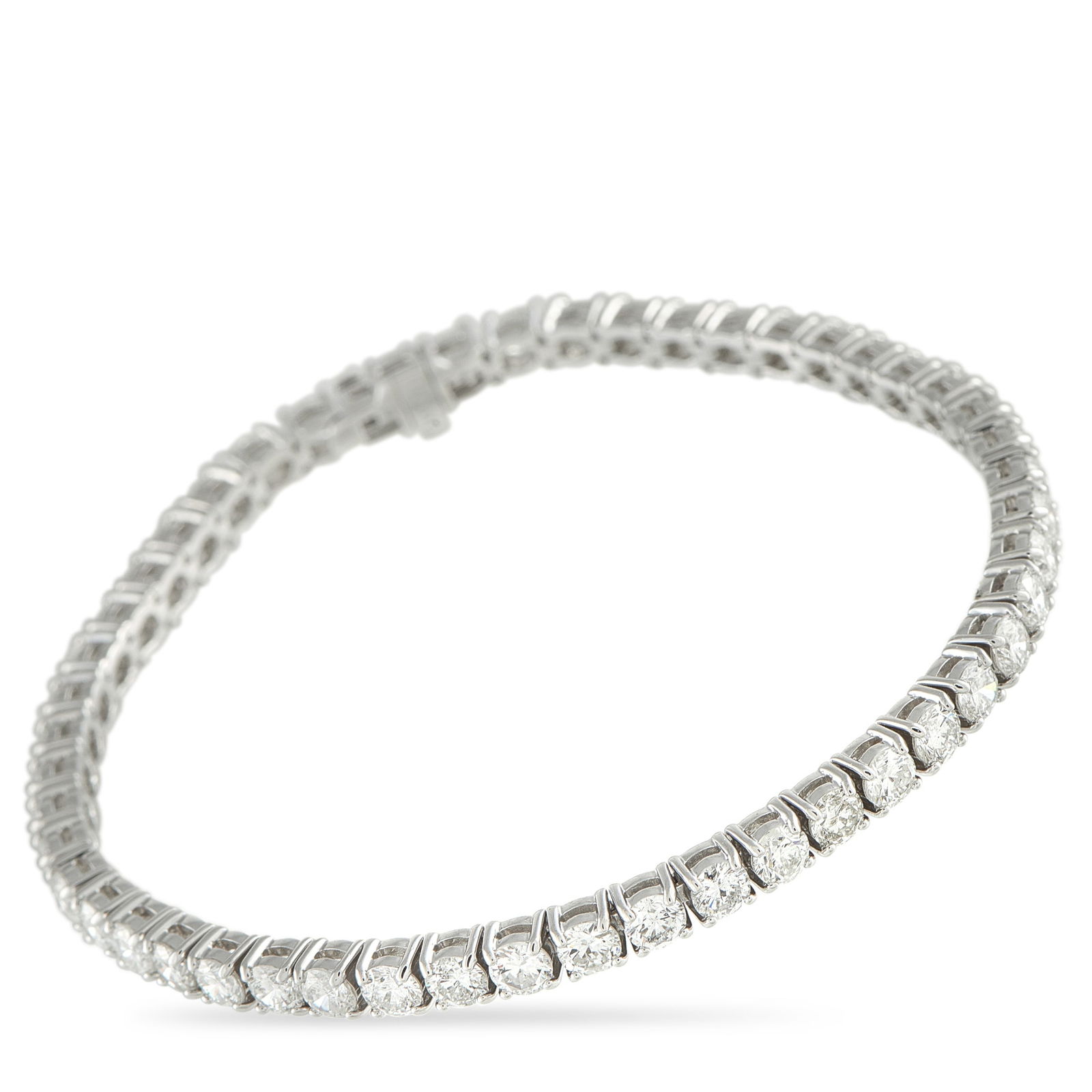 14K White Gold 7.70ct Diamond Tennis Bracelet: Set with 7.70 carats of diamonds, this bracelet gives a full, impressive sparkle that you can instantly see from across the room. The generous carat weight delivers both visual impact and long-term va