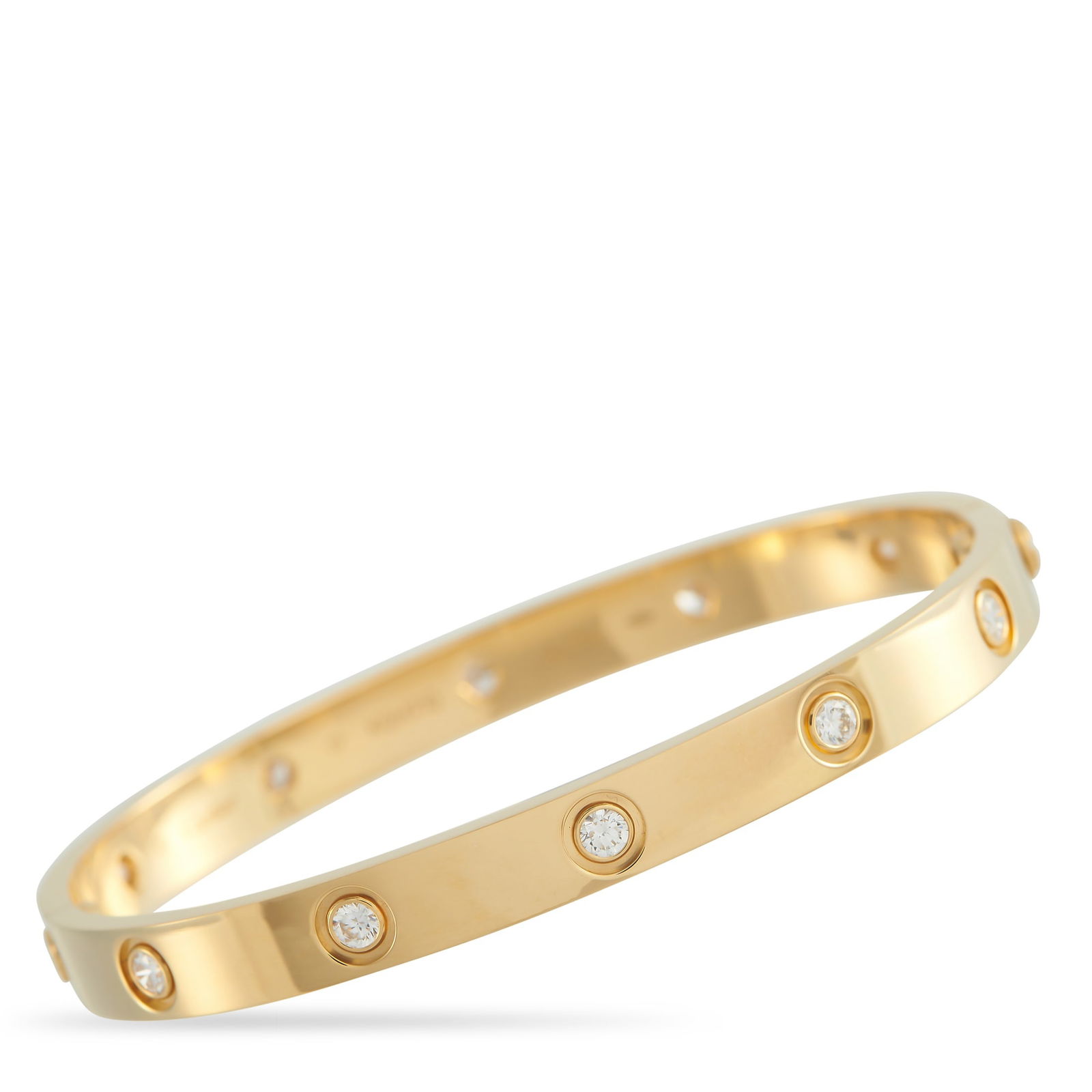 Cartier LOVE 18K Yellow Gold 10 Diamond Bracelet: This Cartier LOVE bracelet perfect for anyone who wants to add an iconic touch of luxury to any ensemble. Crated from lustrous 18K Yellow Gold, a series of 10 round-cut Diamonds shine brightly from th