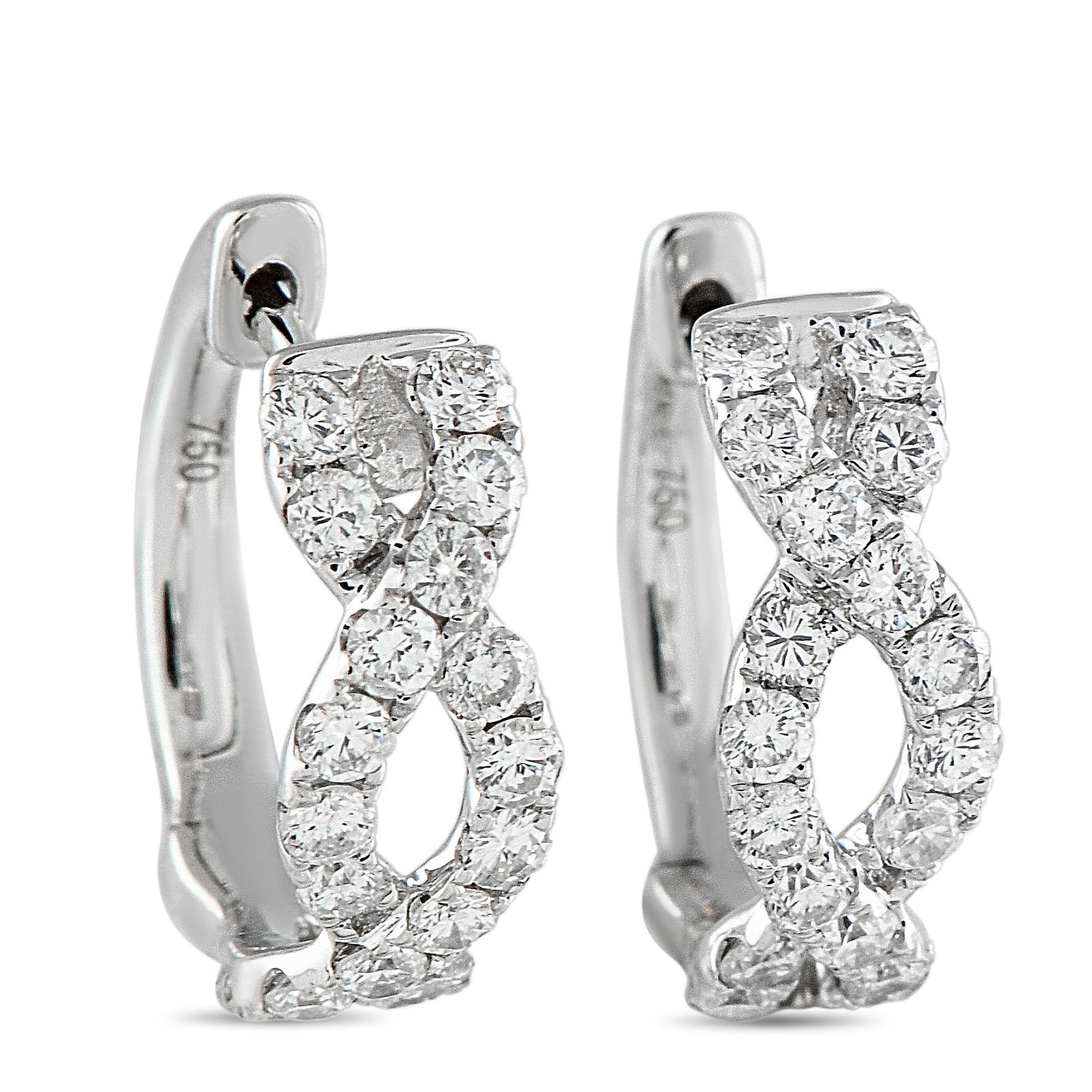 18K White Gold 0.67ct Diamond Earrings: An intricate 18K White Gold setting makes these earrings anything but basic. Understated enough for everyday wear, Diamonds with a total weight of 0.67 carats make them seemingly radiate light. Each o