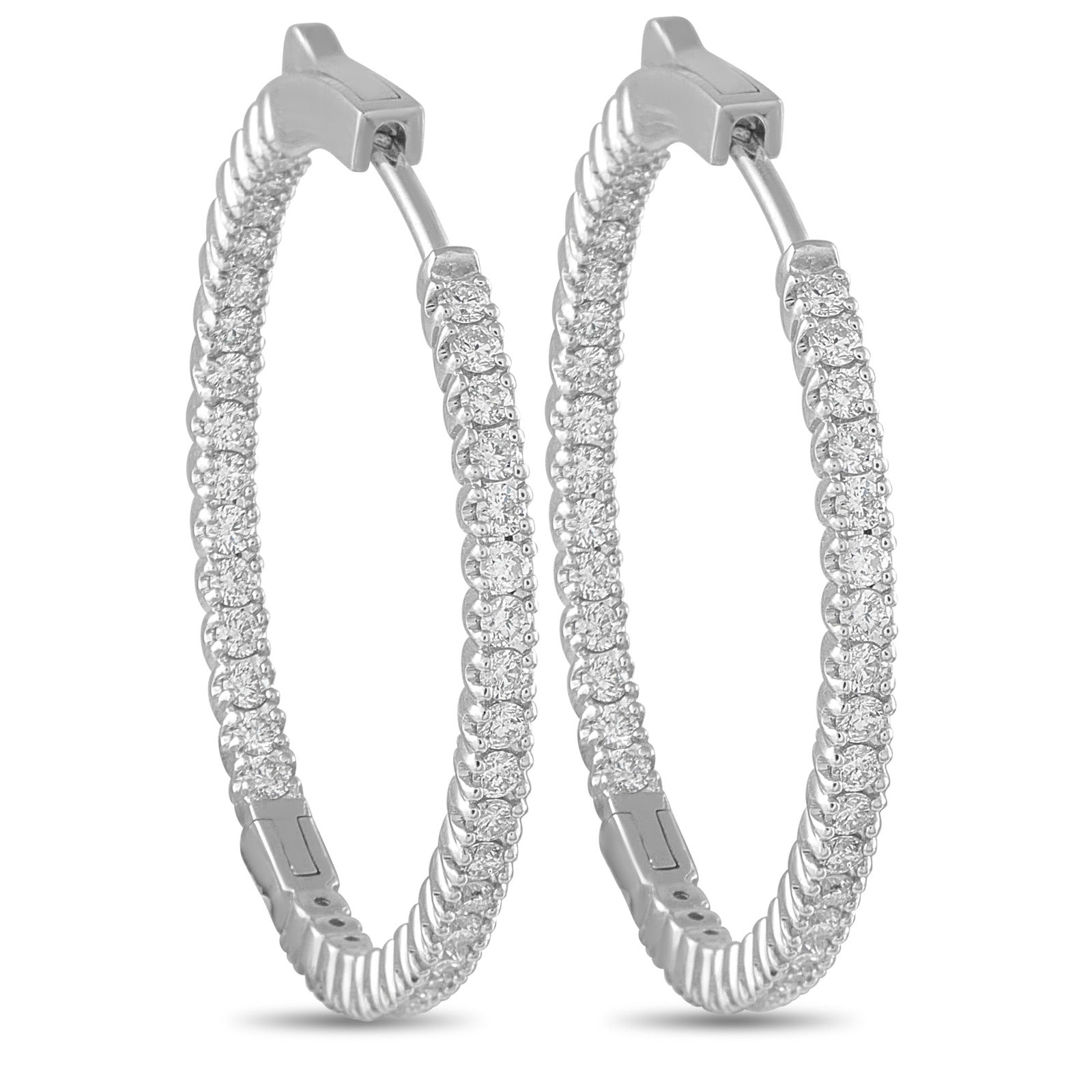 14K White Gold 1.30ct Diamond Inside-Out Hoop Earrings: These hoop earrings will make any ensemble a little more luxurious. Simple and stylish, Diamonds with a total weight of 1.30 carats provide the perfect amount of sparkle. Each earring measures 1.19&rd