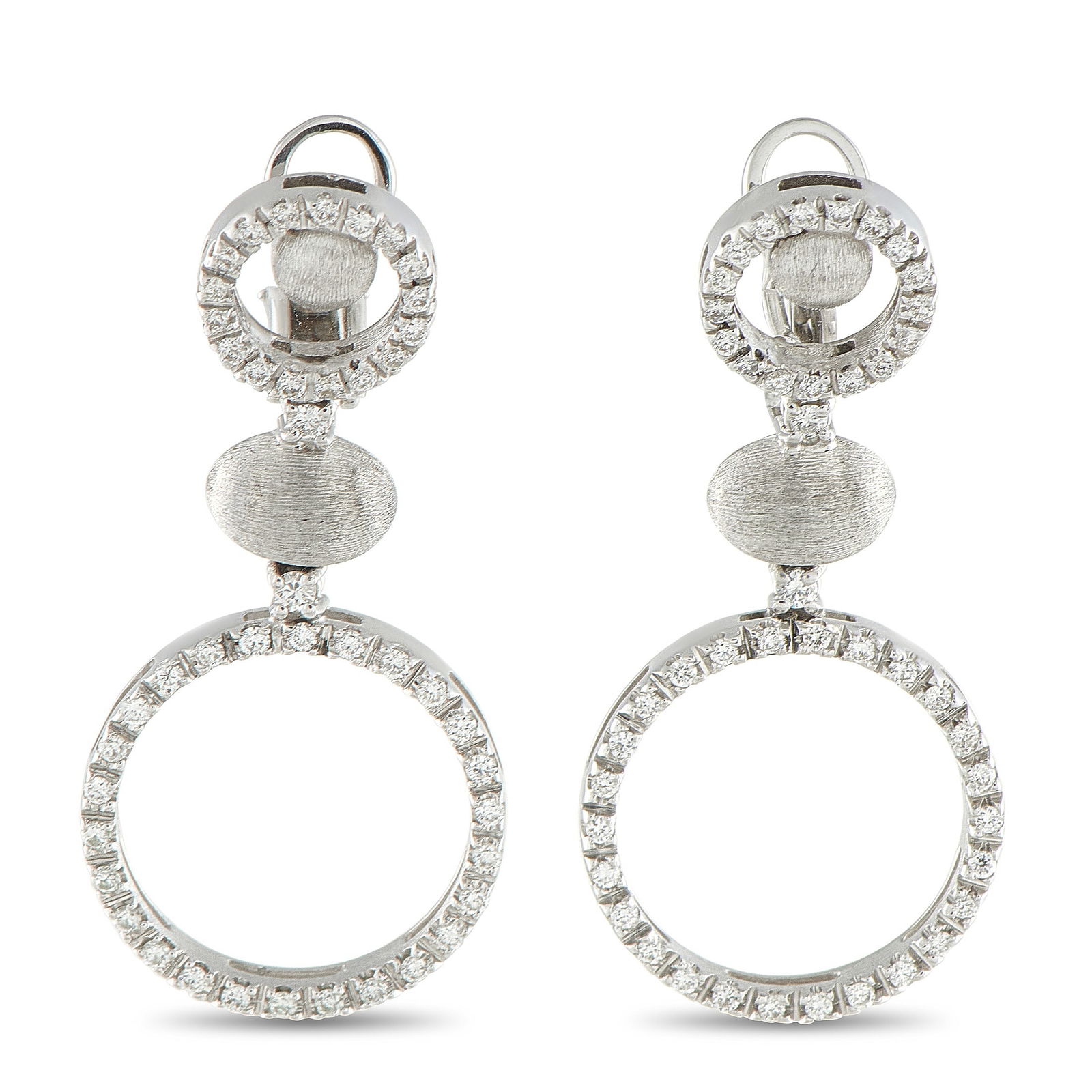Nanis 18K White Gold 1.20ct Diamond Earrings: These Nanis earrings are designed to add sparkle to every movement. Diamonds with a total weight of 1.20 carats elevate the circular 18K White Gold settings. Each earring measures 1.50” long by