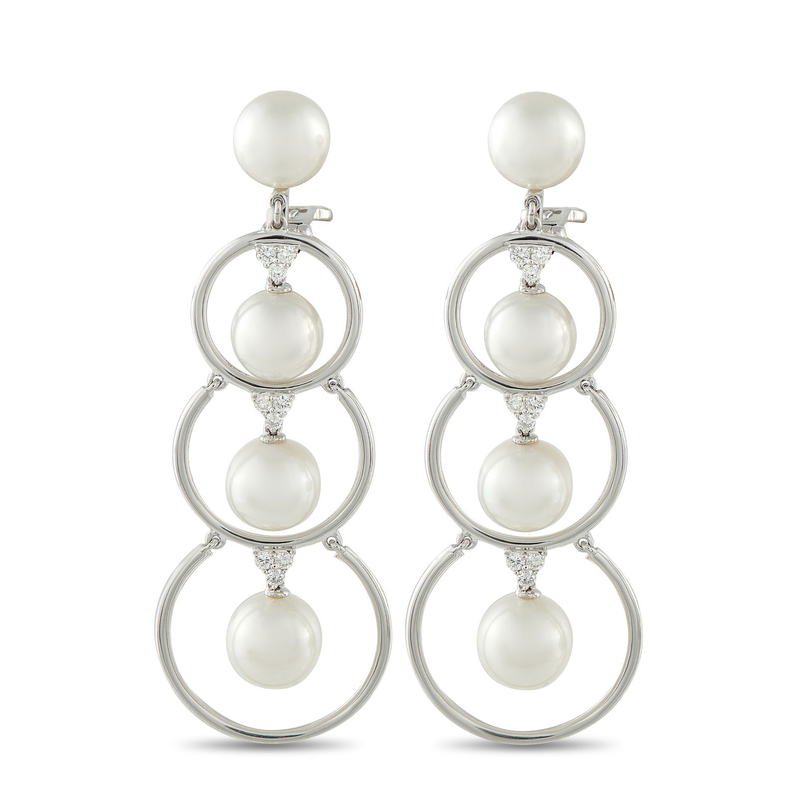 Assael18K White Gold 0.55ct Diamond and Pearl Clip-On Earrings: These Assael earrings are incredibly luxurious. A series of delicate 18K White Gold hoops beautifully showcase 10mm Pearls. Diamond accents totaling 0.55 carats provide the perfect finishing touch. Ea