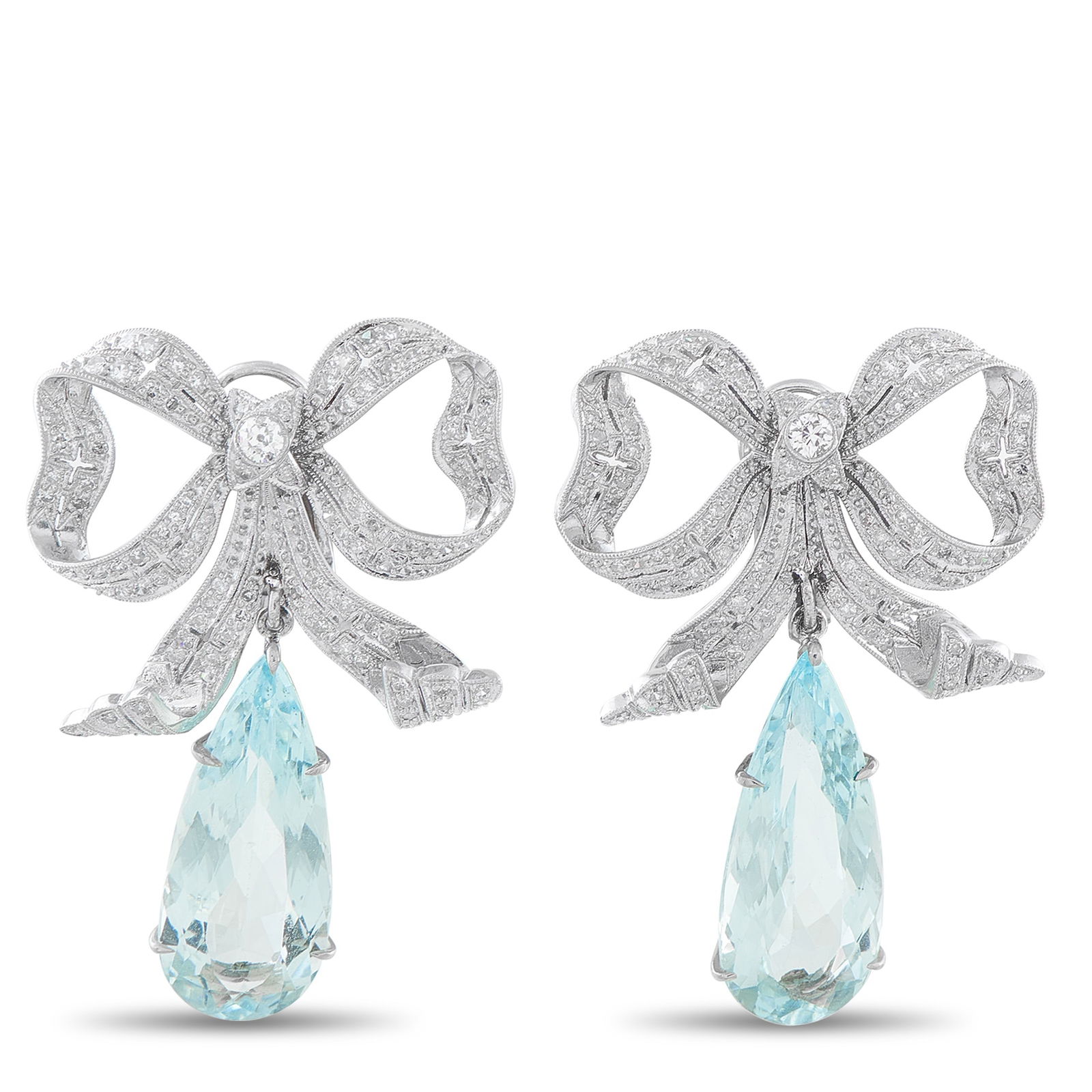 Platinum 0.50ct Diamond and Aquamarine Bow Earrings: A ladylike design makes these luxury earrings endlessly impressive. Featuring Diamonds with a total weight of 0.50 carats, the bow motif will instantly add charm and sophistication to any ensemble. Da