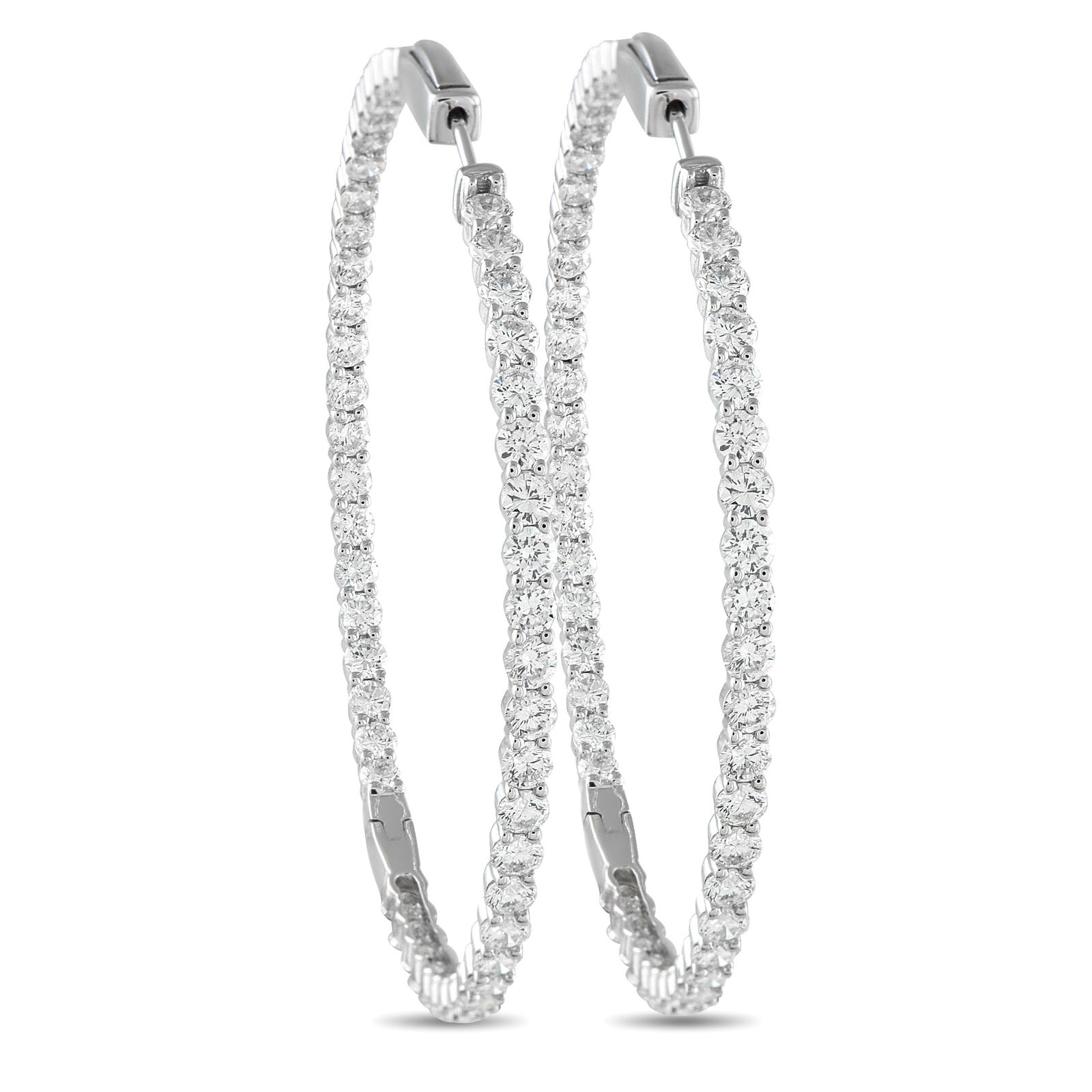 18K White Gold 7.20ct Diamond Inside-Out Hoop Earrings: These slim diamond hoops measure 2 x 2.15 inches, offering a refined presence with just the right hint of drama. Designed in-and-out style, they feature 7.20 carats of diamonds sparkling across both t