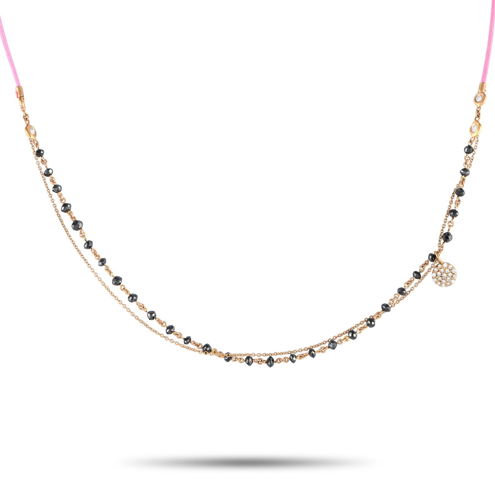 Aaron Basha 18K Rose Gold 1.30ct Black Diamond Necklace: Incredibly dynamic in design, this Aaron Basha necklace exudes upscale bohemian elegance. This playful piece juxtaposes a pink silk cord with an opulent 18K Rose Gold chain. Black diamond beading offe