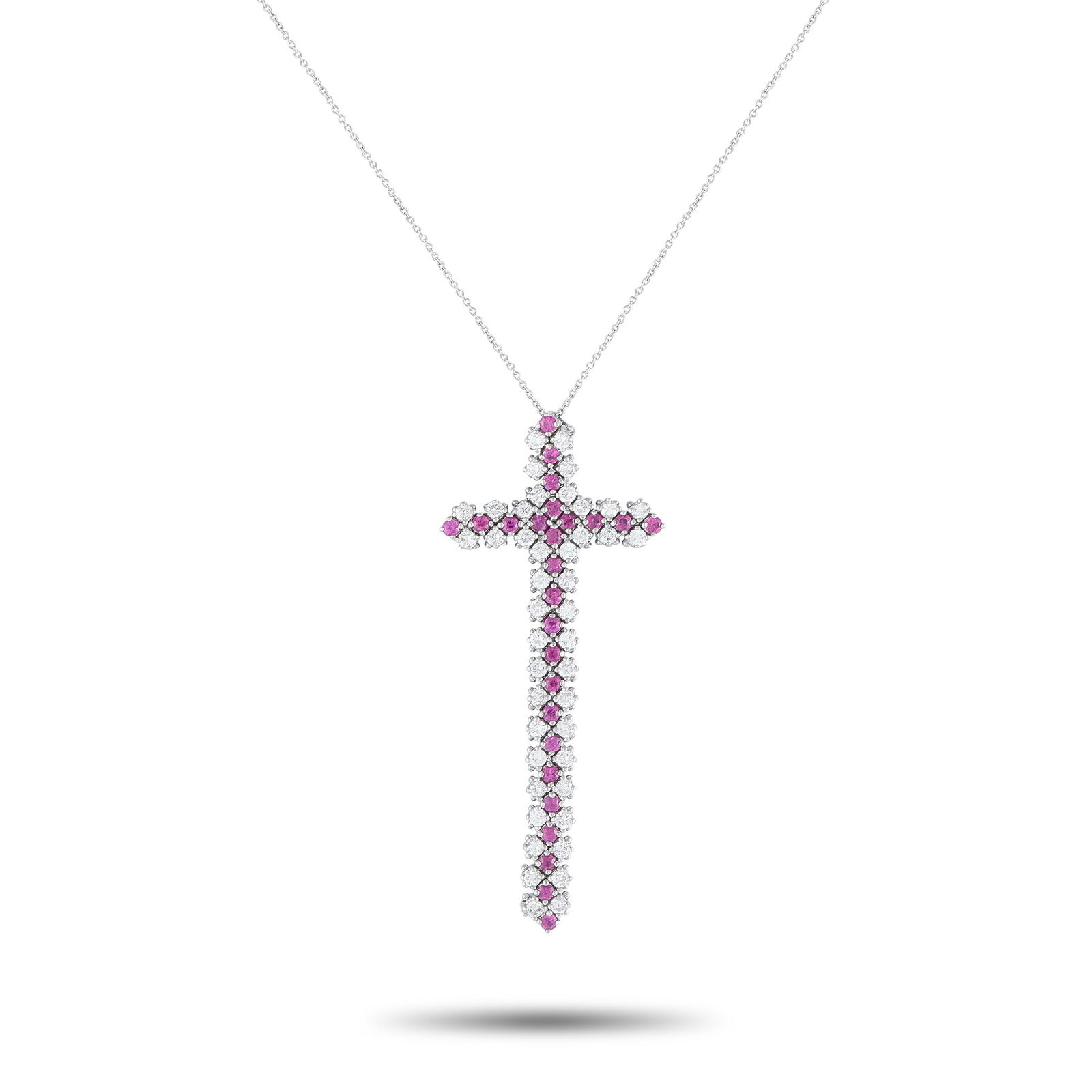18K White Gold 0.75ct Diamond and Ruby Cross Necklace: This breathtaking necklace offers a luxurious way to show your faith. Set in 18K White Gold, the cross pendant comes to life thanks to Ruby gemstones totaling 1.28 carats and Diamond accents with a to