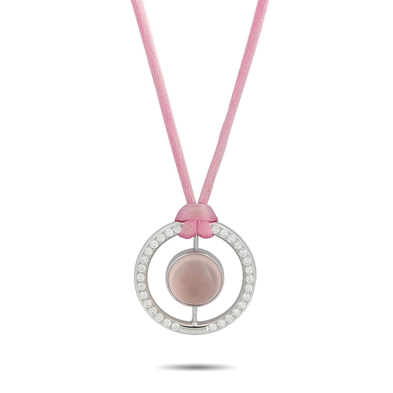 Bucherer 18K White Gold 1.11ct Diamond and Rose Quartz Cord Necklace: This Bucherer necklace is simply unforgettable. Perfect for anyone who loves the color pink, a stunning Rose Quartz gemstone is suspended at the center of a circular 18K White Gold pendant. The pendan