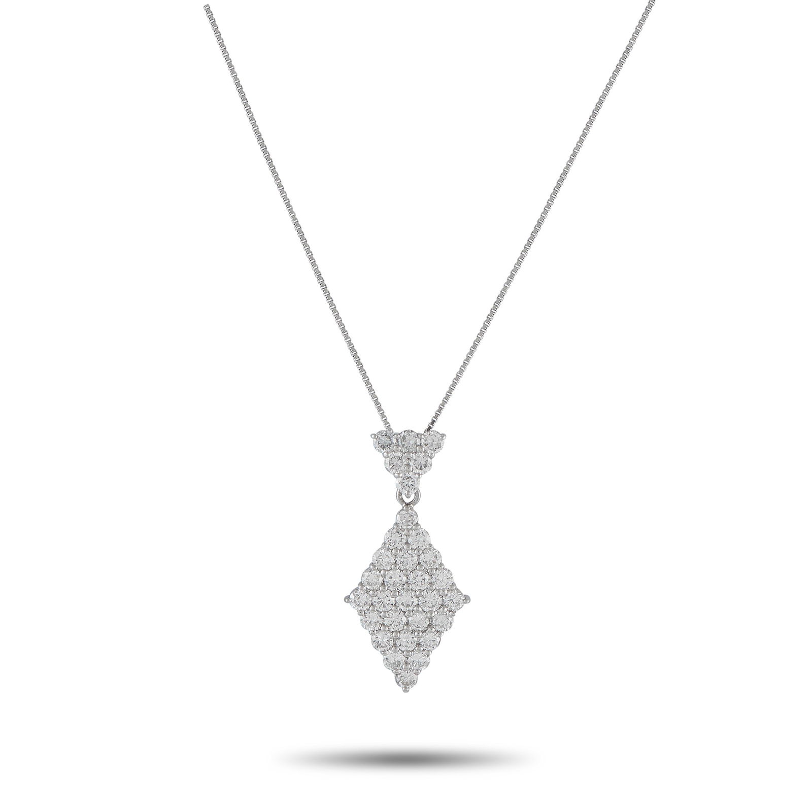 Platinum 2.91ct Diamond Kite Necklace: This piece presents a refined take on geometric elegance. It features a box chain measuring 17.50 inches with a spring ring clasp. The pendant features round brilliant diamonds meticulously arranged t