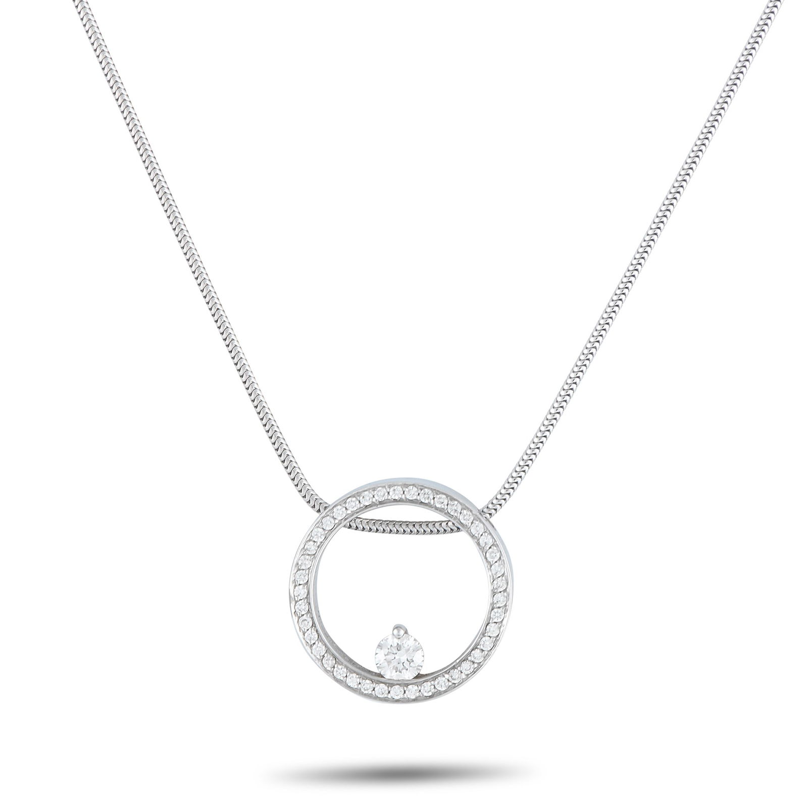 Movado 18K White Gold 0.50ct Diamond Pendant: This Movado necklace possesses a stylish sense of simplicity. A circular pendant measuring 0.82” round makes a statement at the center of this piece’s sleek 17.5” chain. The pendant shin