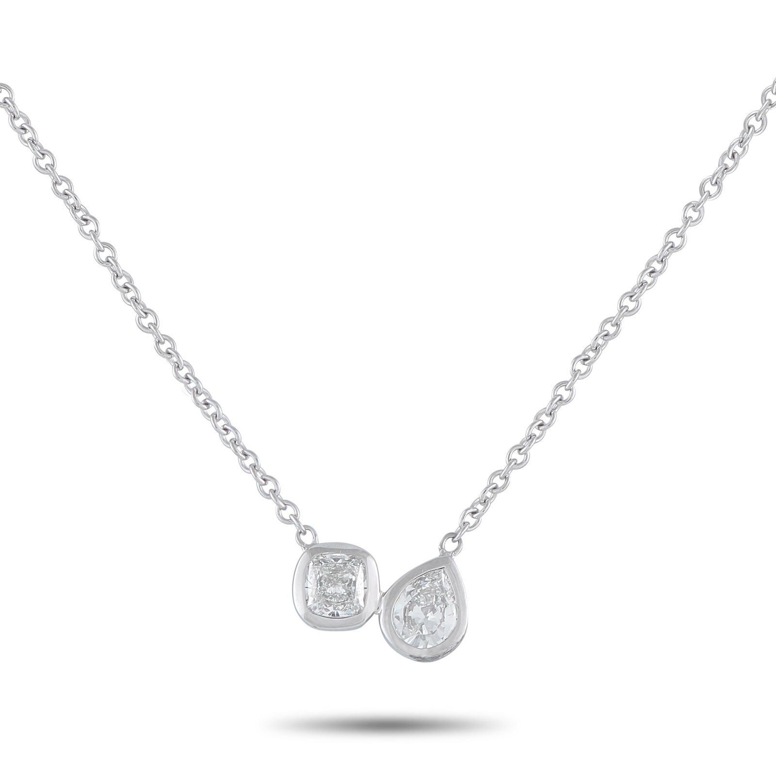 18K White Gold 1.0ct Diamond Necklace: This luxury necklace is sleek and incredibly contemporary in design. The 18K White Gold pendant makes a statement thanks to a cushion cut Diamond and a pear-shaped Diamond – together, they possess a