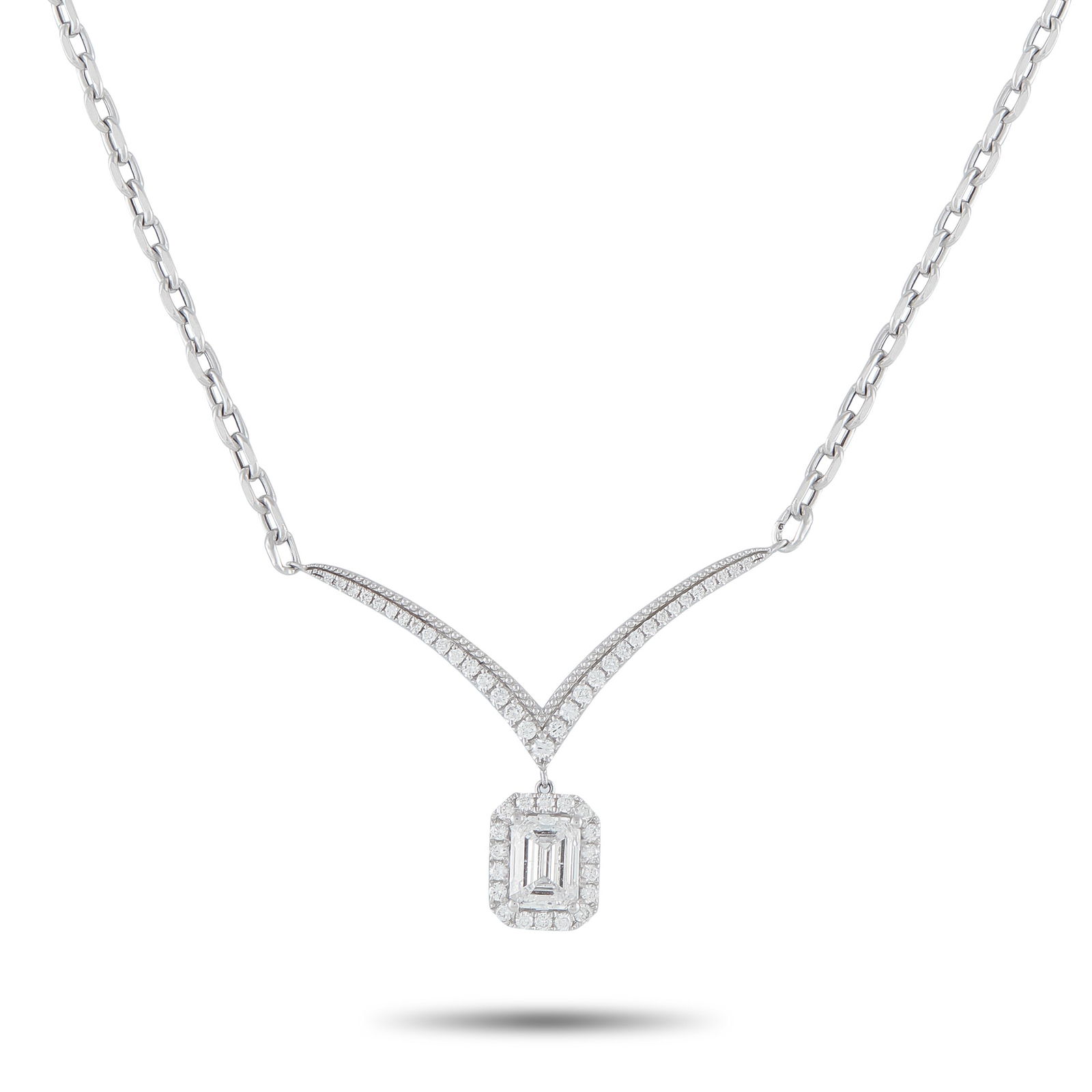 18K White Gold 1.33ct Diamond Necklace: A delicate design makes this necklace an exquisite addition to any ensemble. The 1.03 carat Diamond center stone dangles delicately from the sleek pendant, while additional Diamond accents totaling 0.