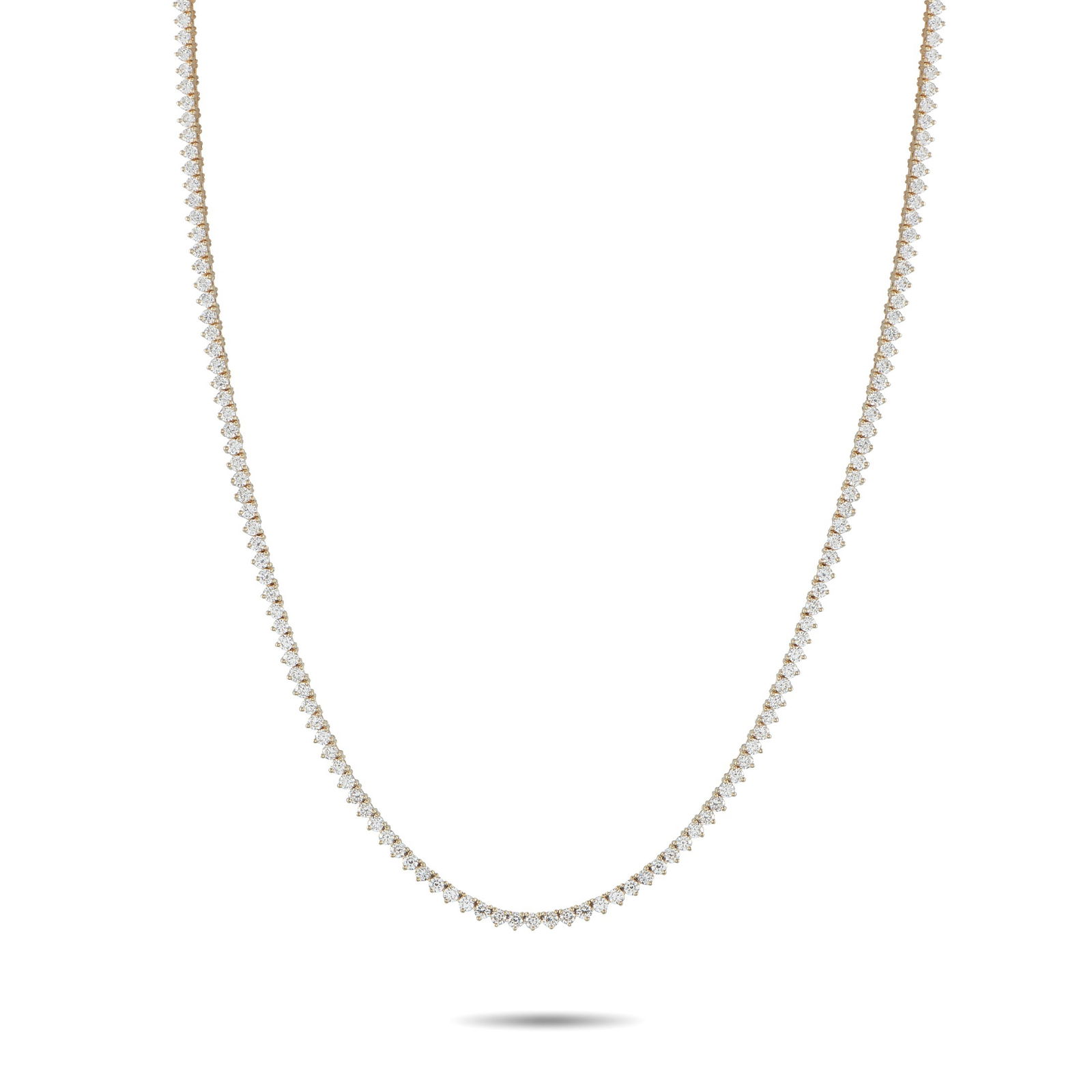 14K Yellow Gold 7.25ct Lab-Grown Diamond Tennis Necklace: Add a touch of timeless elegance to any ensemble with this impeccably crafted tennis necklace. Made with a simple 14K Yellow Gold setting, a series of sparkling Lab Grown Diamonds totaling 7.25 carats