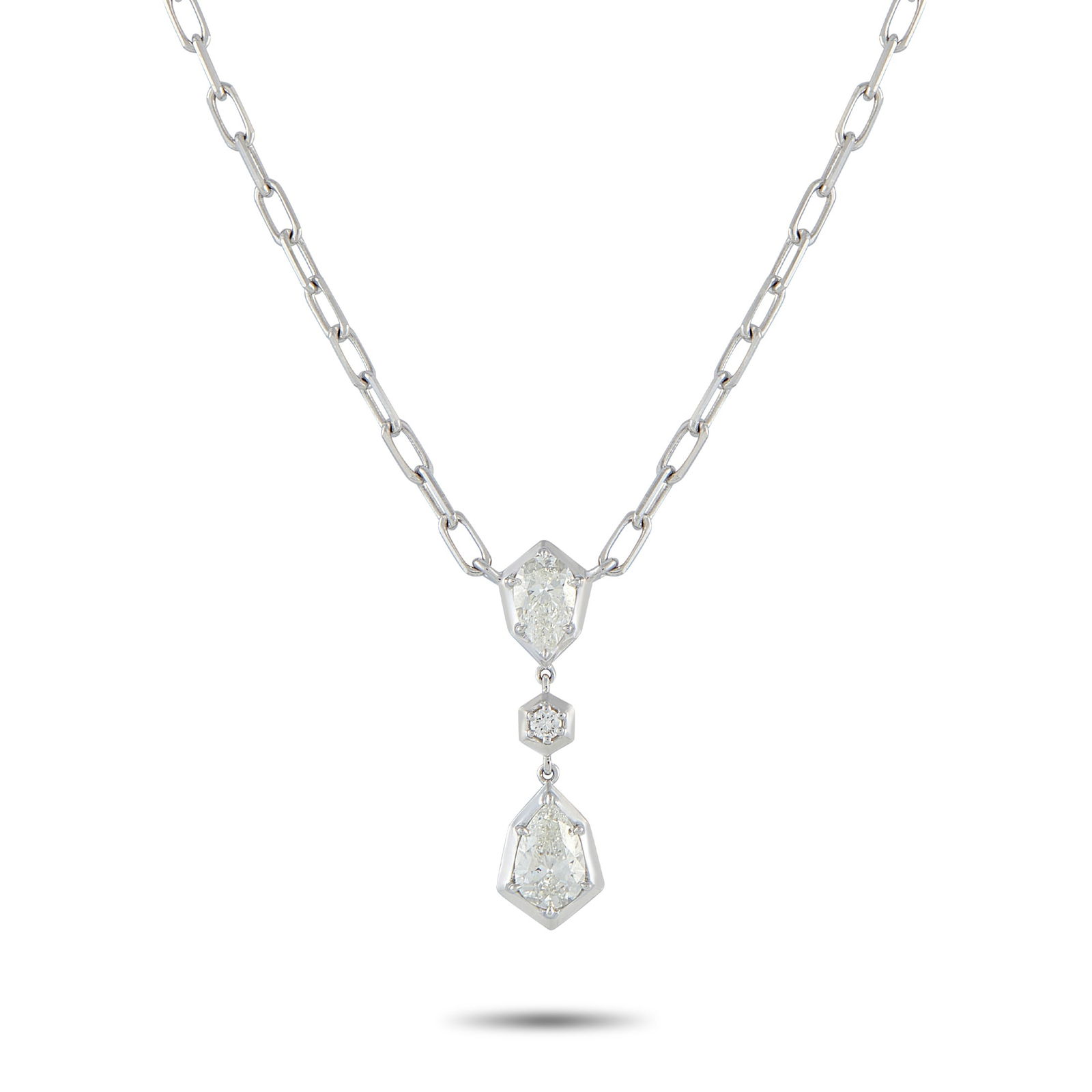 18K White Gold 1.32 ct Diamond Necklace: Geometry leads the design, with every stone in this necklace positioned to reinforce its bold look. A pear-shaped diamond, set on four prongs, rests on an angular white gold frame with its pointed end