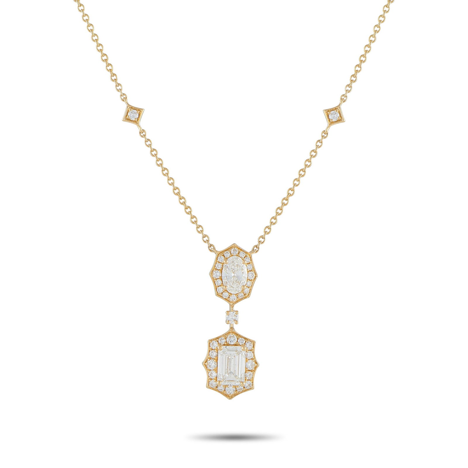 18K Yellow Gold 2.76ct Diamond Geometric Necklace: Warm yellow gold sets the tone for this necklace, accented by four round diamonds placed along the chain in tilted square frames. The pendant carries an oval diamond outlined by a crisp octagonal halo