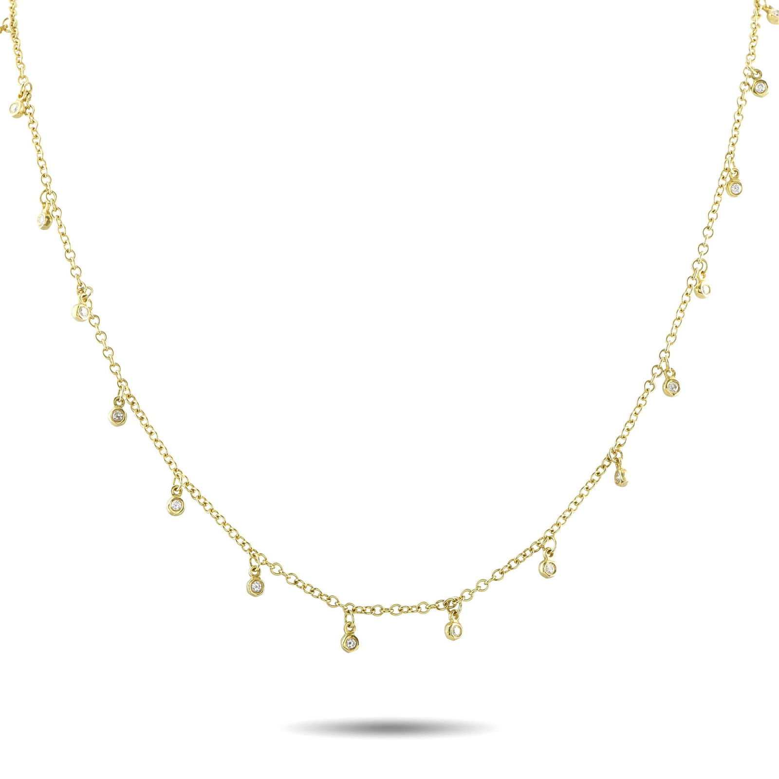 Ippolita18K Yellow Gold 1.05ct Diamond Long Necklace: Crafted in 18K yellow gold, this Ippolita necklace measures 32 inches long and drapes with graceful fluidity along the neckline. Its delicate chain is accented with evenly spaced bezel-set round diamo