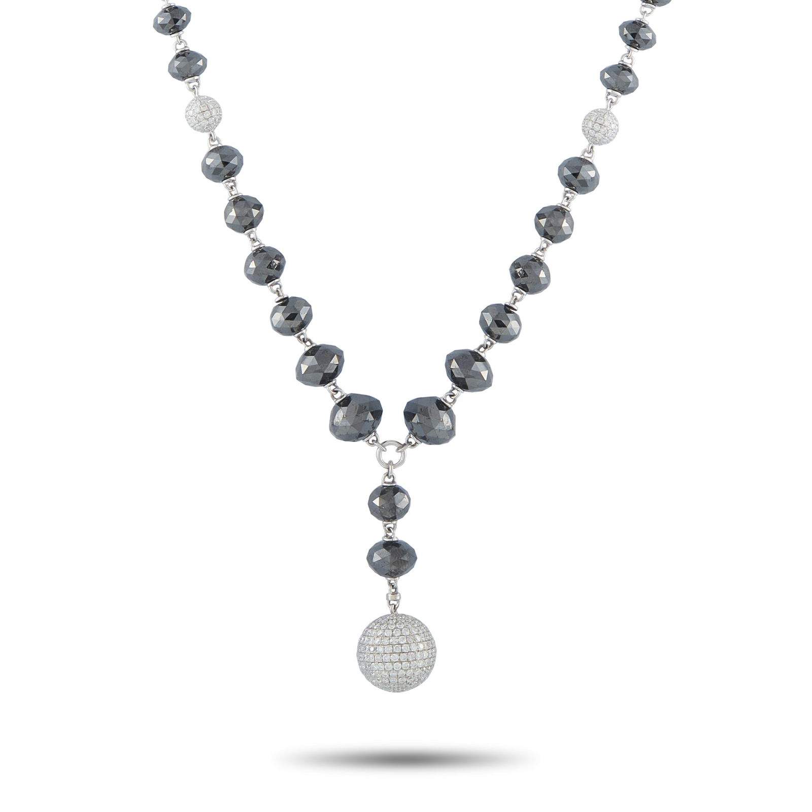 18K White Gold 15.49ct White and Black Diamond Necklace: This luxury necklace is incredibly stylish. Crafted from 18K White Gold, Black Diamonds with a total weight of 10.91 carats add color, texture, and dimension to the delicate design. Orbs covered in Wh