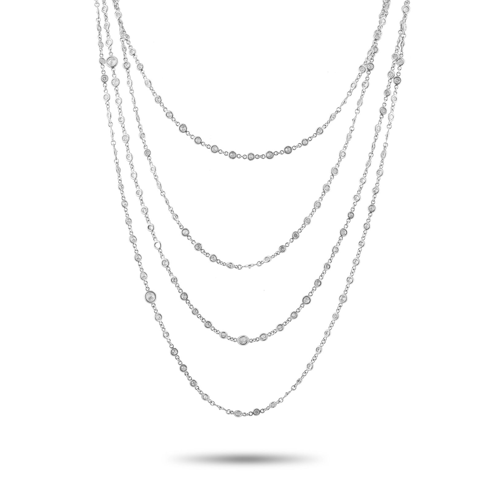Platinum 13.72ct Diamond Necklace: This luxury necklace is dramatic and understated all at once. Measuring 104” long, the exquisite Platinum chain can be worn in a stylish triple-wrapped design. Bezel-set Diamonds with a total we