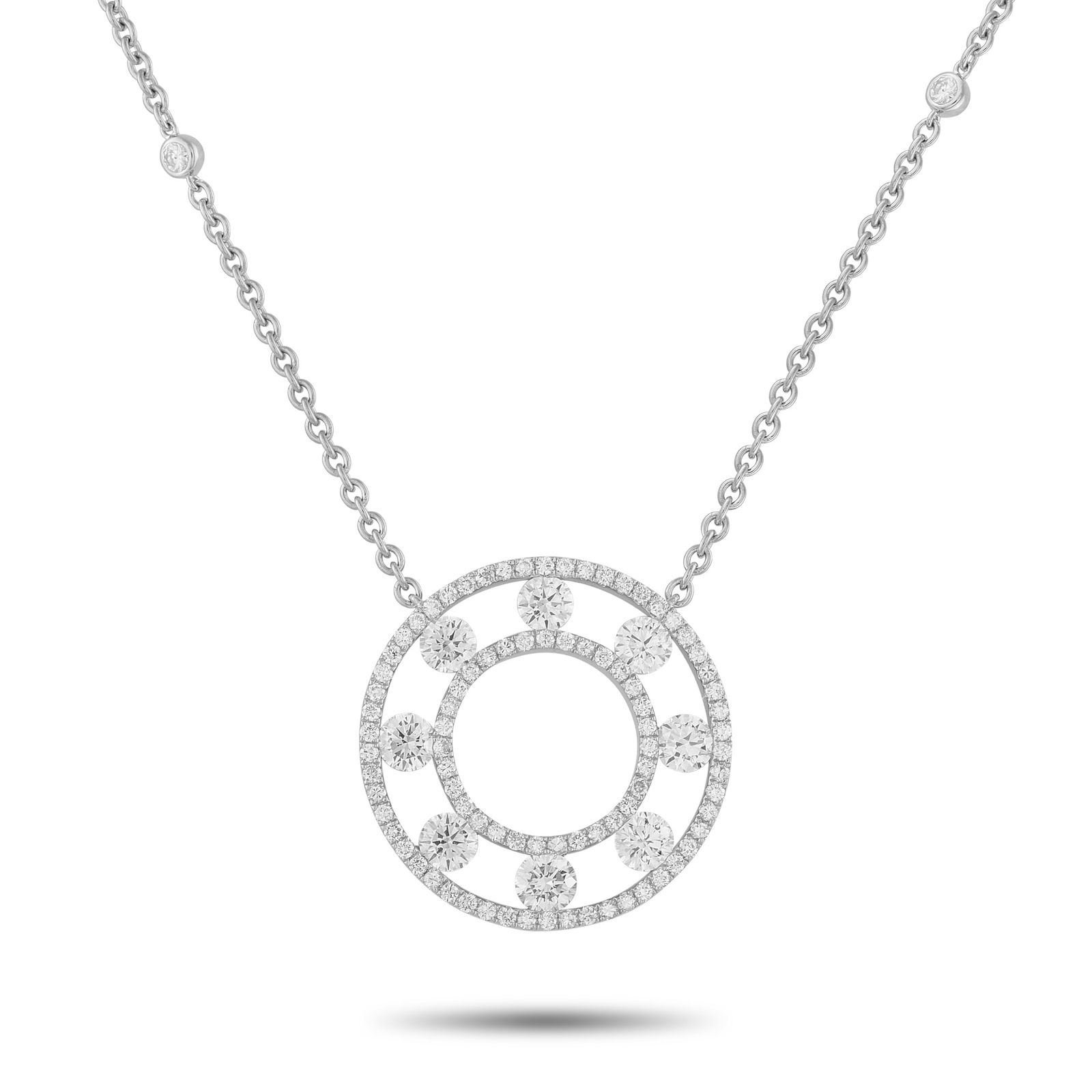 18K White Gold 1.70ct Diamond Necklace: This luminous necklace will inspire endless compliments. Diamonds with a total weight of 1.70 carats cover this piece’s circular pendant and extend onto the delicate 17” chain. The pendant mea