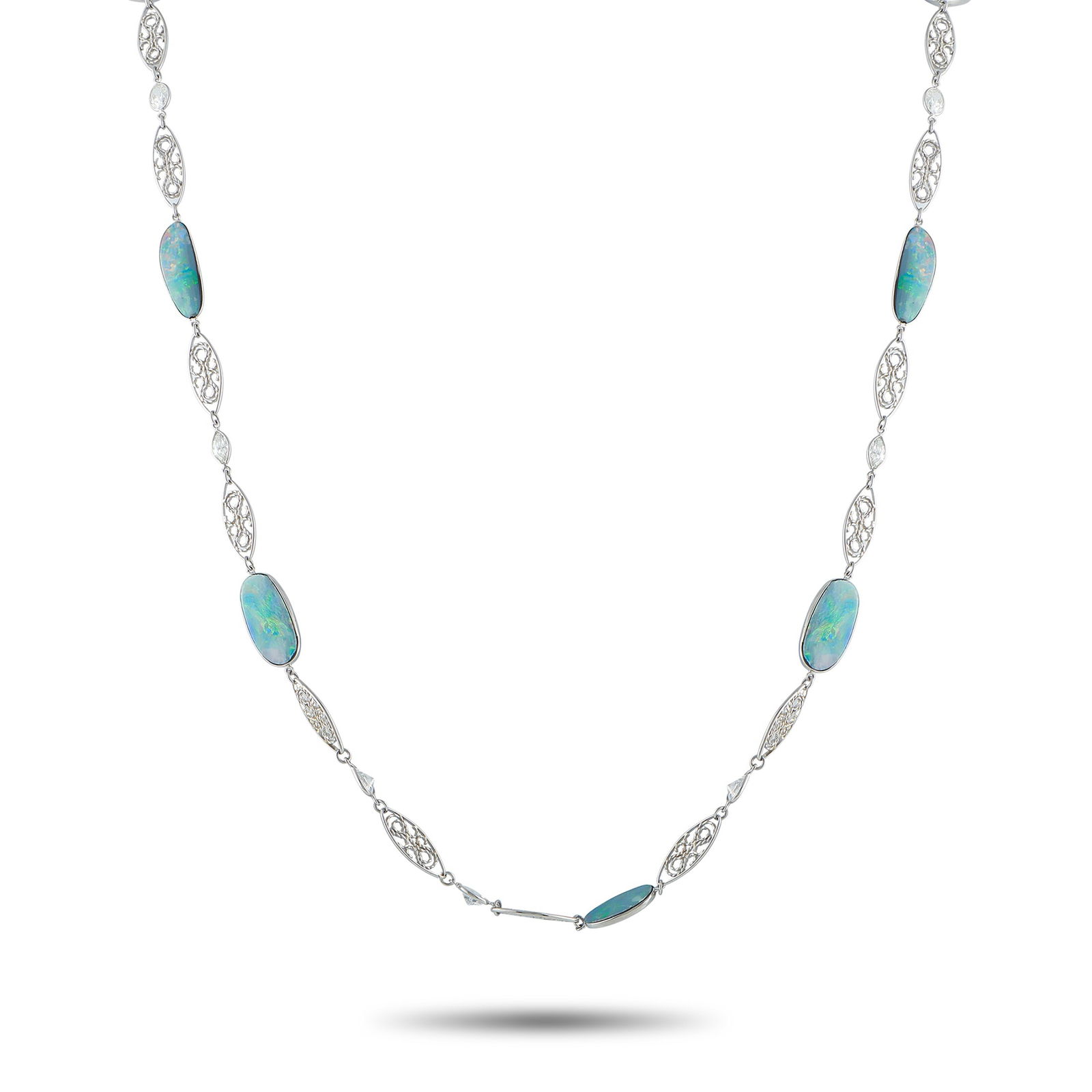 Platinum 5.50ct Diamond and Opal Necklace: This luxury necklace is filled with dynamic details. Intricate metalwork and sparkling Diamond accents totaling 5.50 carats elevate the overall design. Fiery blue Opal gemstones make it a unique acces