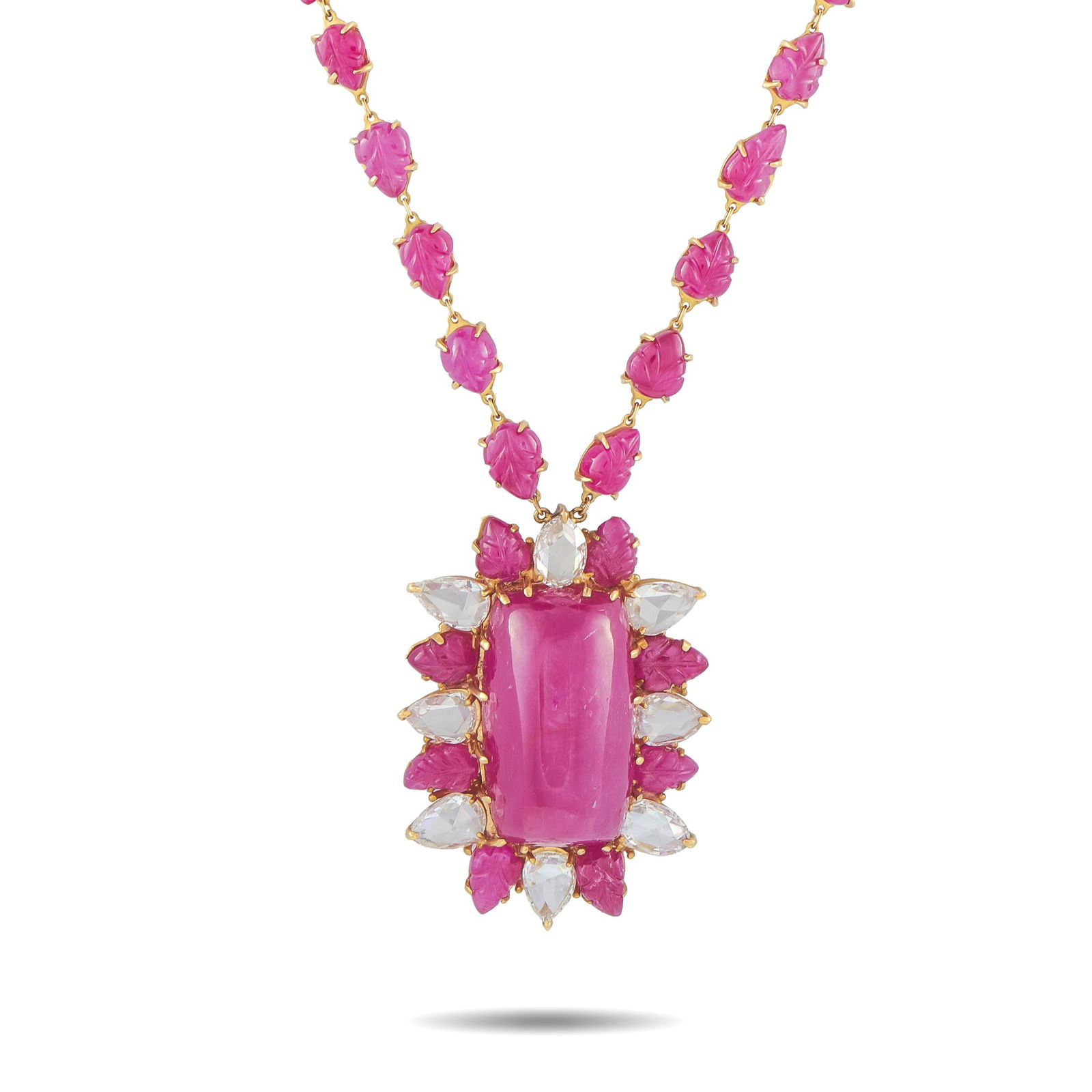 18K Yellow Gold 4.0ct Diamond and Ruby Necklace: Add a stylish pop of color to any ensemble with this luxury necklace. Ruby gemstones totaling 28.0 carats carved into intricate leaf motifs accent the pendant and extend onto the chain. The pendant co