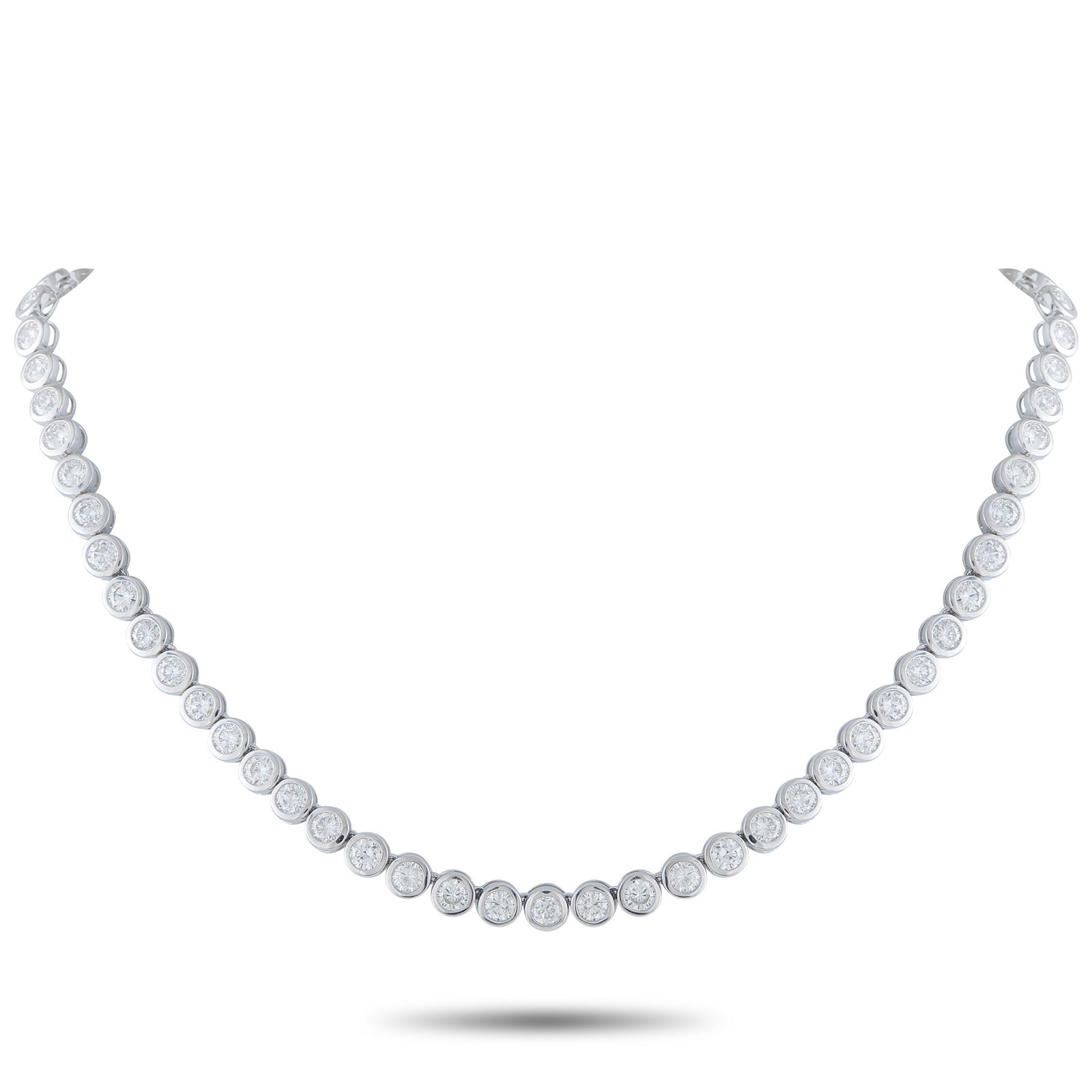 18K White Gold 17.50ct Diamond Necklace: This classically elegant necklace will never go out of style. Bezel-set Diamonds with a total weight of 17.50 carats make this luxury piece elegant, contemporary, and incredibly impressive. Set in 18K