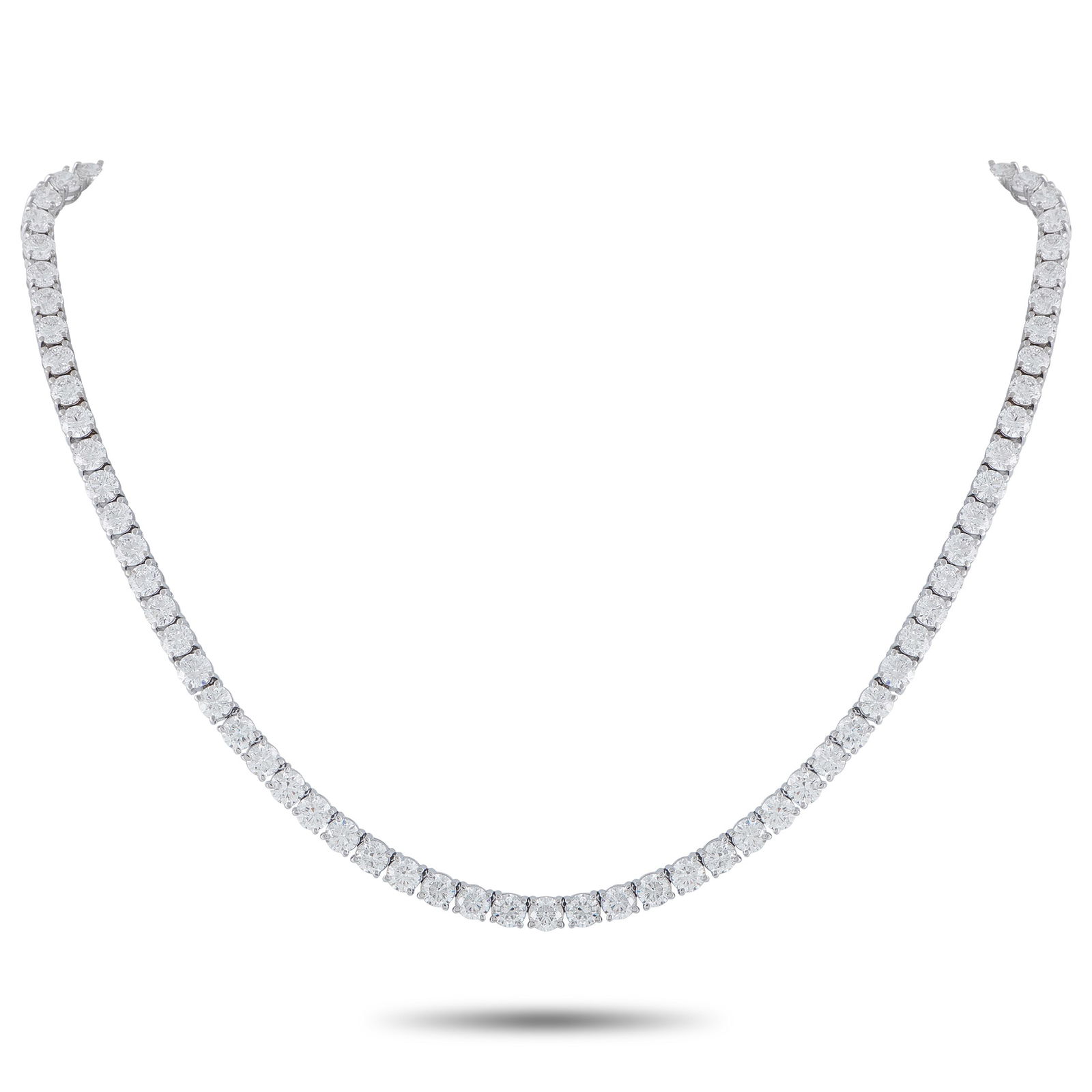 18K White Gold 35.25ct Diamond Necklace: A series of round-cut Diamonds with a total weight of 35.25 carats make this luxury necklace come alive every time it catches the light. Crafted from 18K White Gold, this scintillating accessory is a