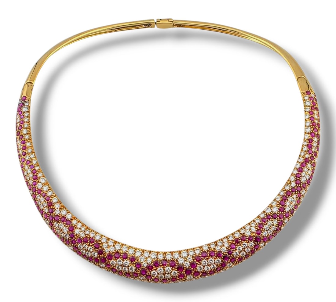 8.3ct Ruby and 13.5ct Diamond Necklace in 18K Gold: 8.3ct Ruby and 13.5ct Diamond Necklace in 18K Gold Masterfully crafted in 18K yellow gold, this luxurious necklace dazzles with 264 brilliant diamonds and 166 vivid rubies, totaling an impressive 13.5