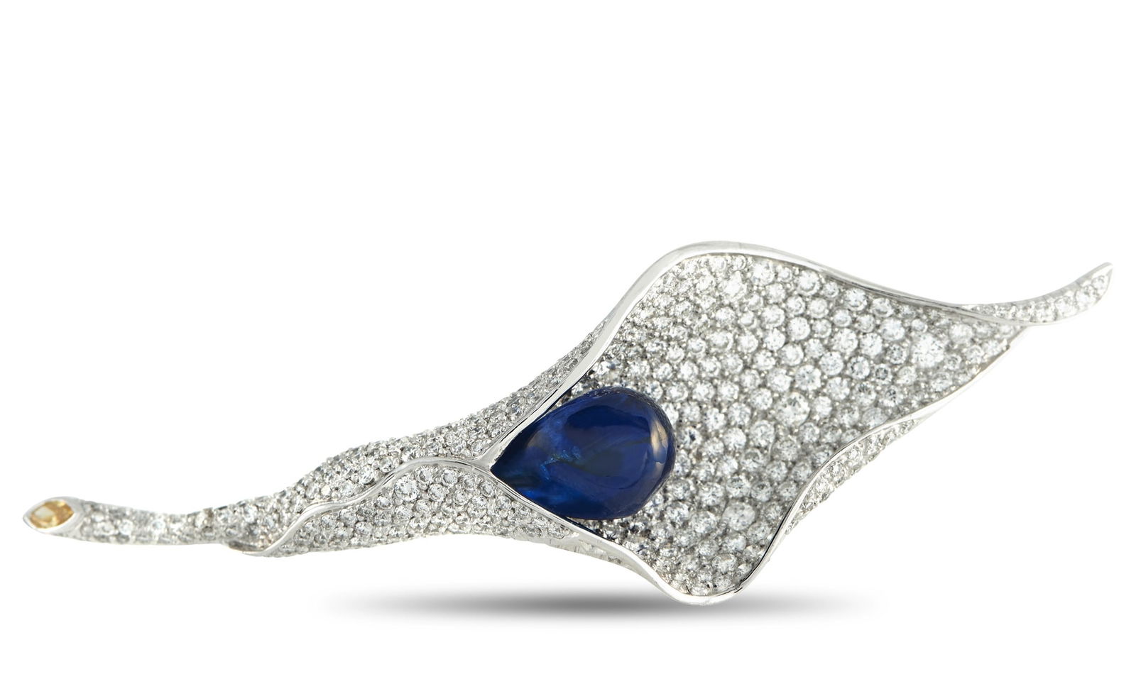 Platinum 4.43ct Diamond and Sapphire Calla Lily Brooch: Platinum 4.43ct Diamond and Sapphire Calla Lily BroochFounded in St. Moritz, La Serlas is known for pieces that balance technical skill with visual drama. This brooch reflects that approach through de