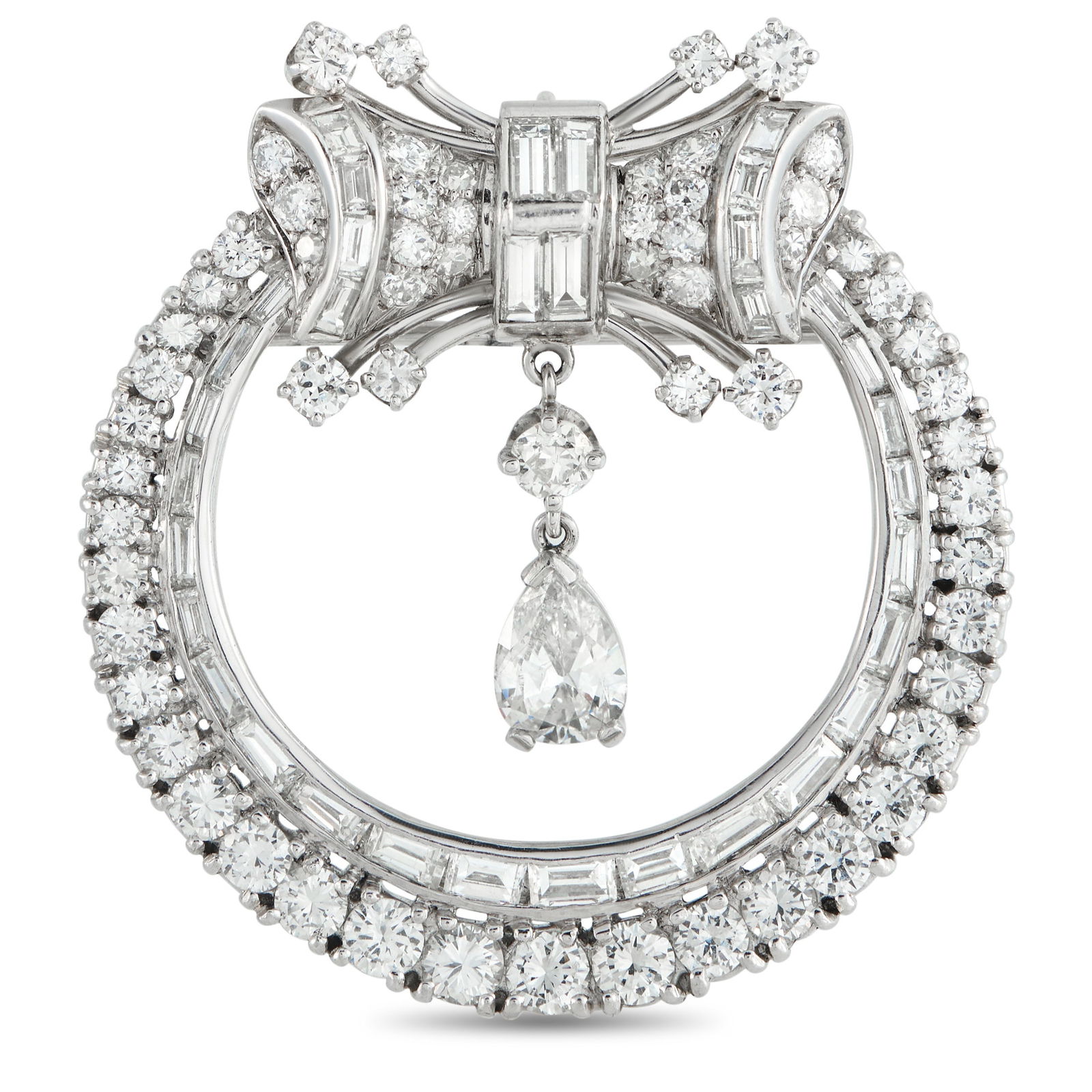 Platinum 5.80ct Diamond Art Deco Brooch: This Art Deco brooch will add vintage elegance to any ensemble. Sparkling Diamonds elevate the circular setting, while a dazzling pear-shaped Diamond dangles at the center. Together, this piece featur