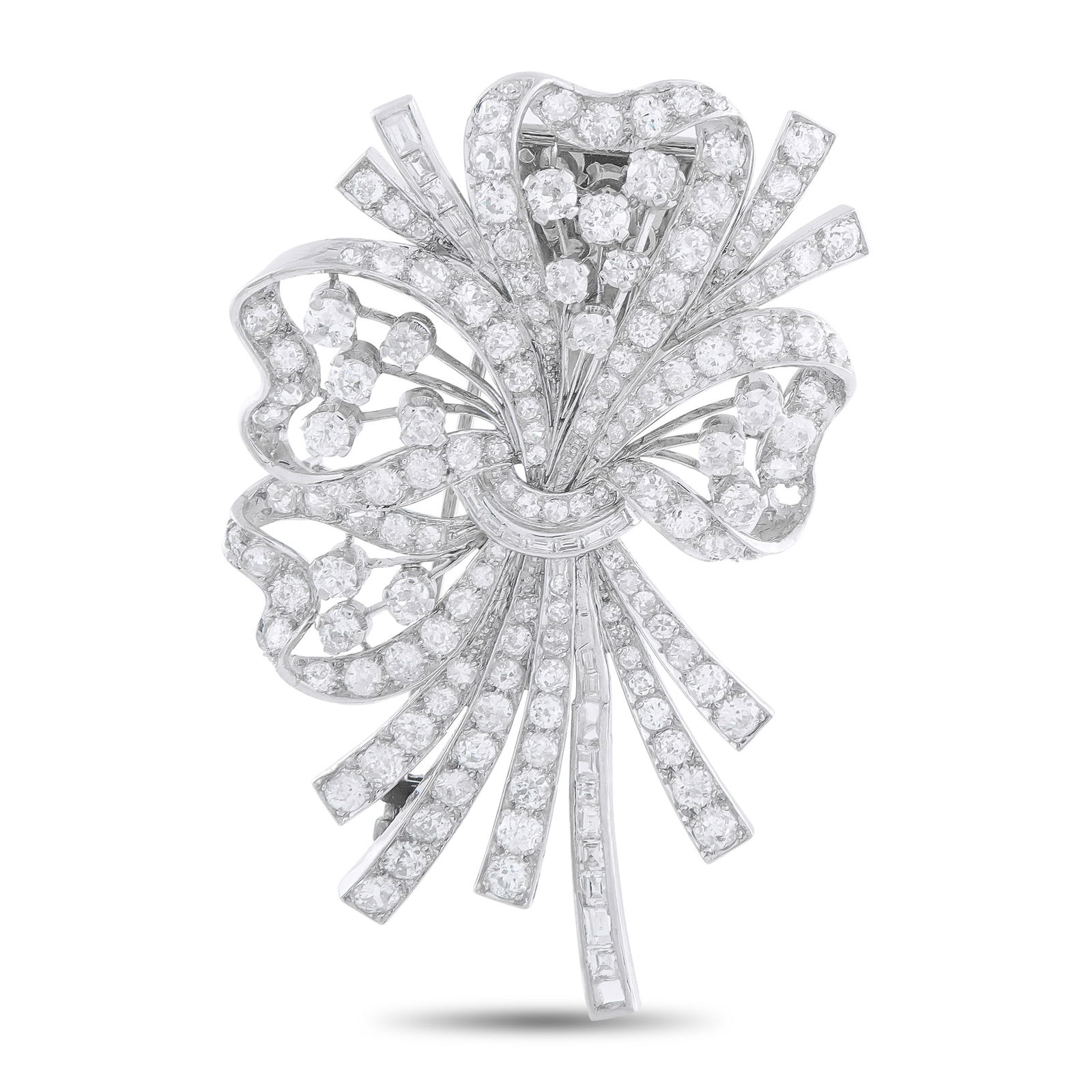 Platinum 5.50ct Diamond Brooch: This luxury brooch will continually capture your imagination. The intricate Platinum setting seemingly radiates light thanks to sparkling Diamonds with a total weight of 5.50 carats. It measures 2.57&
