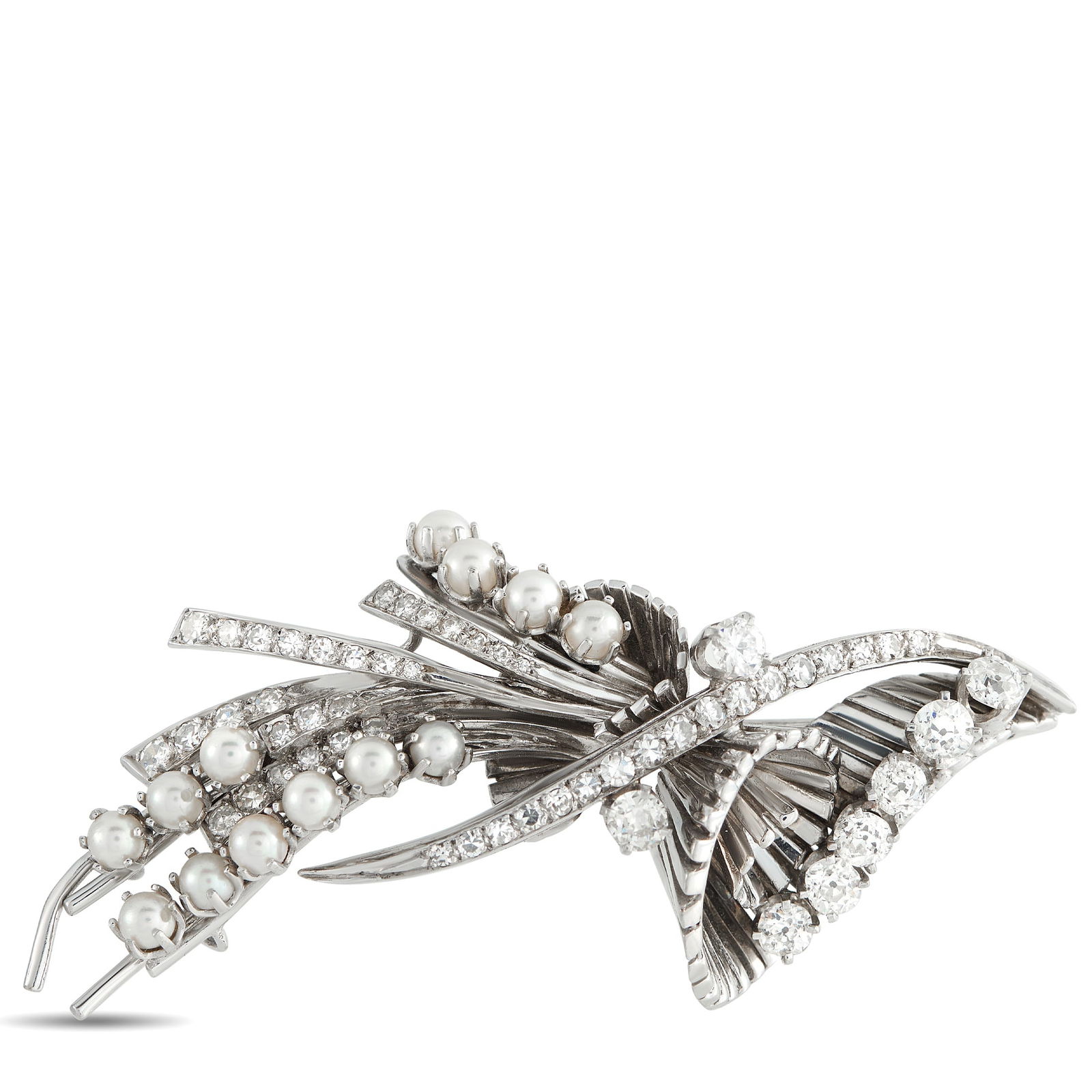 Platinum 3.65ct Diamond and Pearl Brooch: Add a touch of drama to any ensemble with this luxury brooch. The Platinum setting features a dynamic, asymmetrical design, which is elevated by inset Diamonds with a total weight of 3.65 carats. Pear