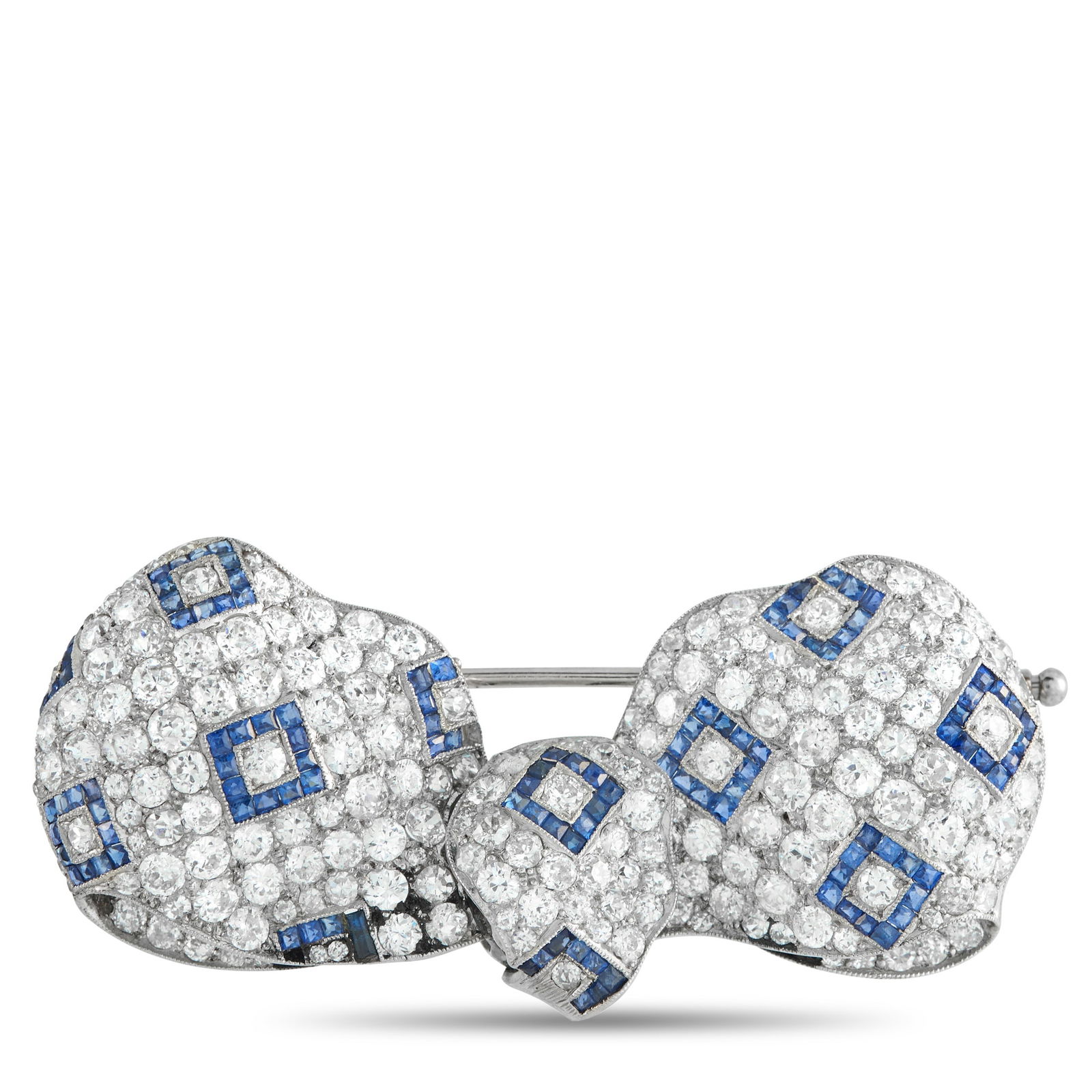 18K Yellow Gold and Platinum 5.0ct Diamond and Sapphire Art Deco Brooch: This Art Deco bow brooch is a fine example of high-jewelry artistry. A mosaic of brilliant diamonds encrusts the entire surface, while sapphires arranged in concentric diamond shapes provide a strikin