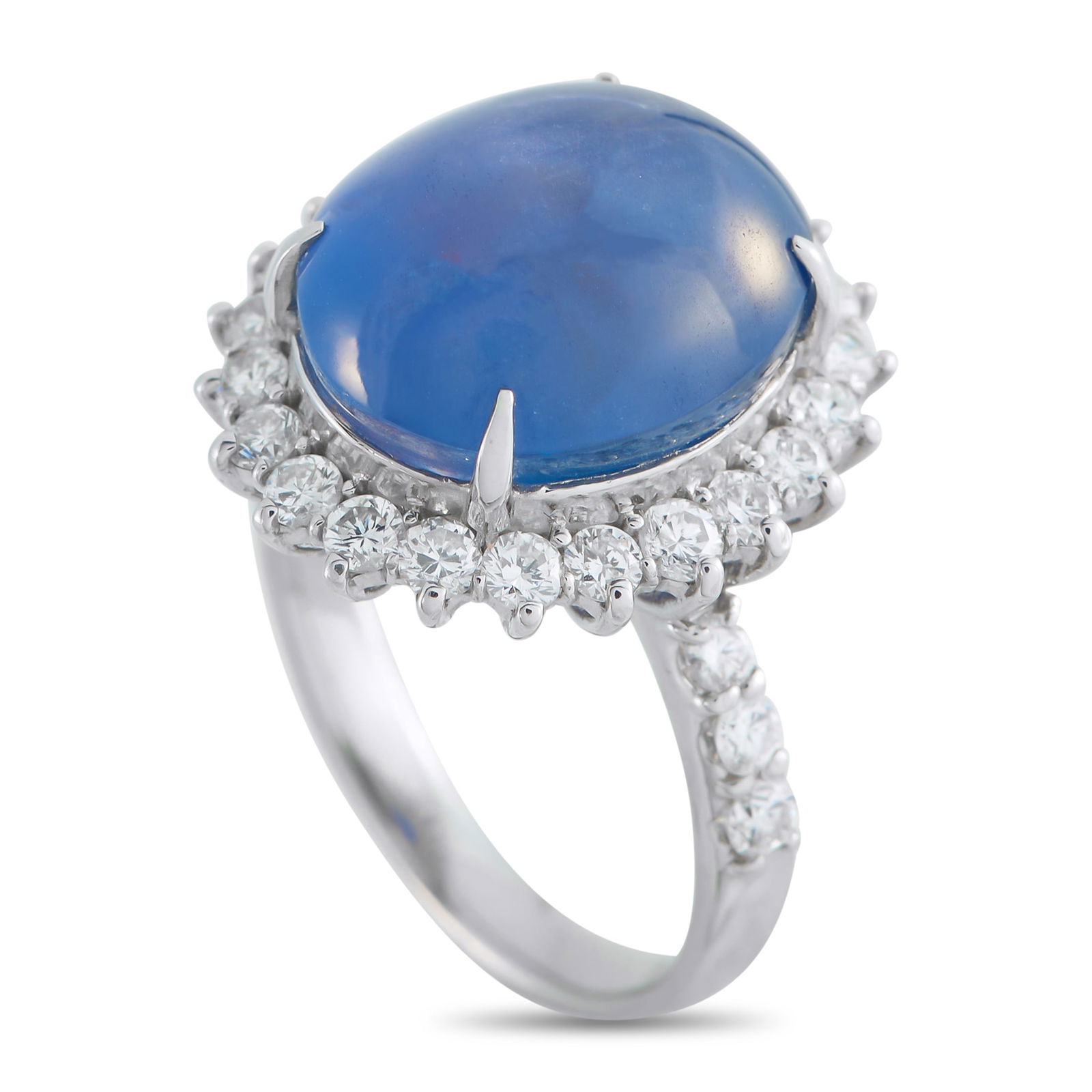 Exclusive Platinum 1.04ct Diamond and Sapphire Ring: This ring features a stunning, sophisticated design that will never go out of style. A 14.61 carat Sapphire cabochon adds a pop of color to the center of this piece’s sleek Platinum setting. Diamond