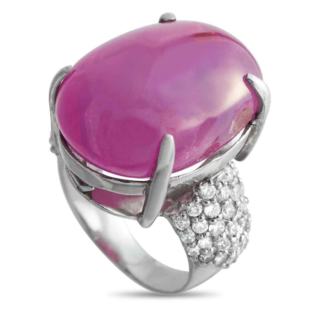 Exclusive Platinum 1.25ct Diamond and Burma Ruby Ring: Featuring a massive 46.48 ct cabochon Burma ruby, this ring instantly delivers a stop-and-stare effect through its sheer, sculptural height. The pinkish-red stone is set high on a polished platinum ba