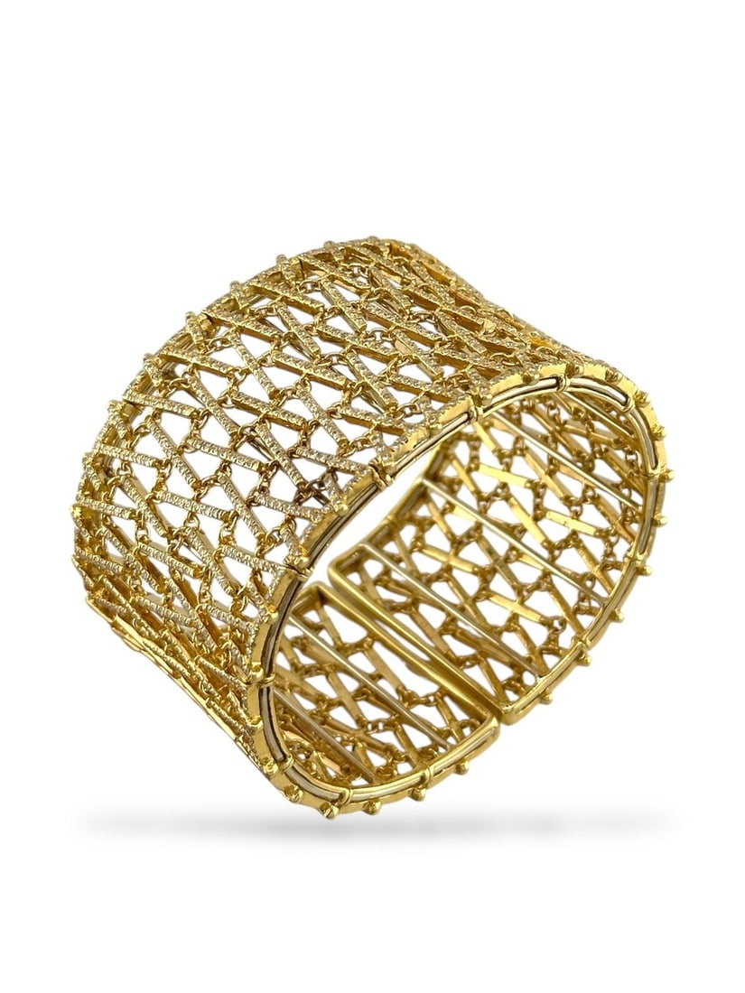 18 kt. Yellow gold, 18K Yellow Gold Flexible Diamond Cuff 3.08ct. tw. Diamond (Natural): 18K Yellow Gold Flexible Diamond Cuff BraceletThis magnificent cuff bracelet is crafted in 18K yellow gold and entirely embellished with hundreds of brilliant-cut diamonds. Designed in a flexible stre