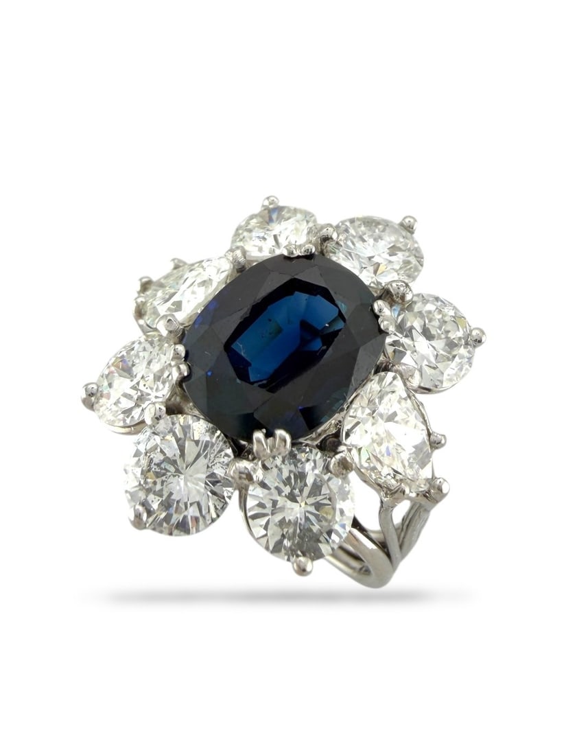 14 kt. White gold, Exclusive GIA Certified 14K White Gold 3.00ct Sapphire and 4.70ct Diamond Ring: Exclusive GIA Certified 14K White Gold 3.00ct Sapphire and 4.70ct Diamond Ring This elegant women’s ring is crafted in 14 karat gold and centered by a striking oval sapphire weighing approximately 3