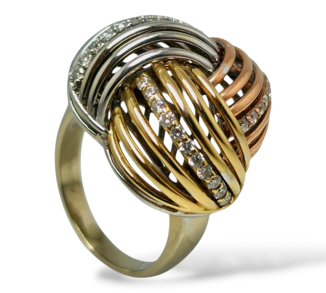 18 kt. White gold, Yellow gold, 18K Tri-Color Gold Cocktail Ring with 0.50 Carats of Round: 18K Tri-Color Gold Cocktail Ring with 0.50 Carats of Round Brilliant DiamondsA vibrant display of elegance and artistry, this cocktail ring features 33 round brilliant-cut diamonds set in luxurious 18